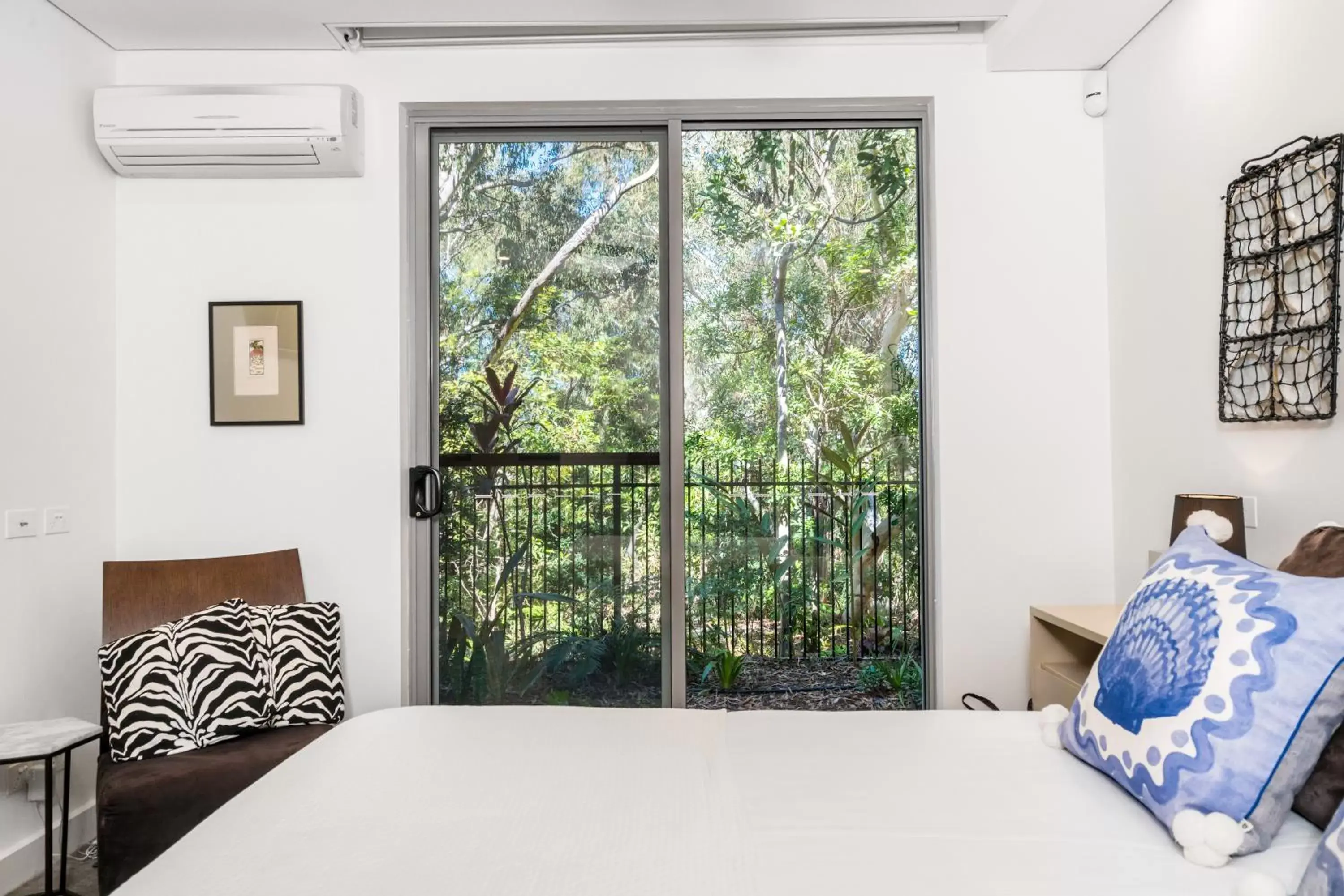 Bedroom, Bed in The Oasis Apartments and Treetop Houses