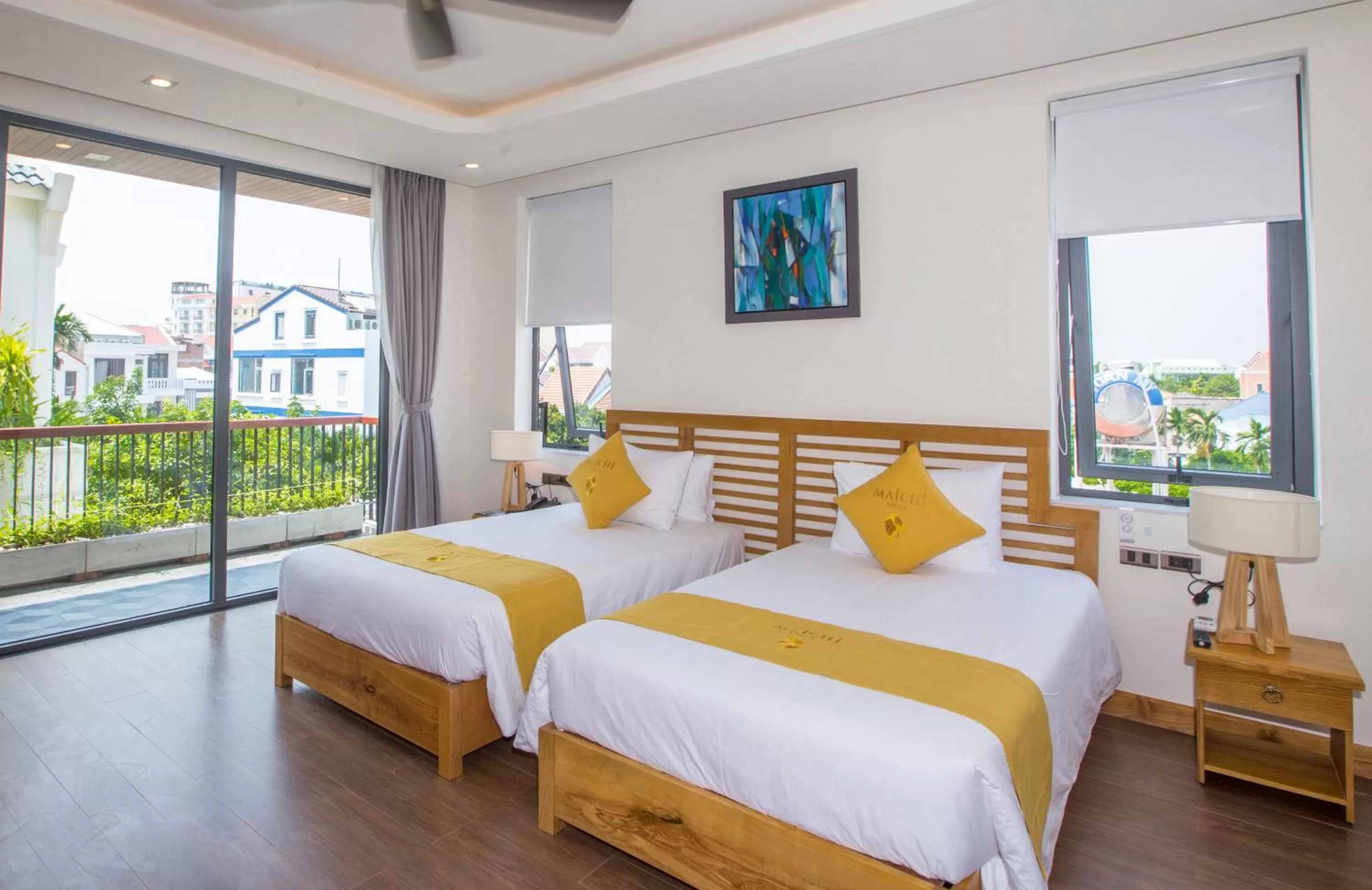 Photo of the whole room, Bed in MaiChi Villa Hoi An