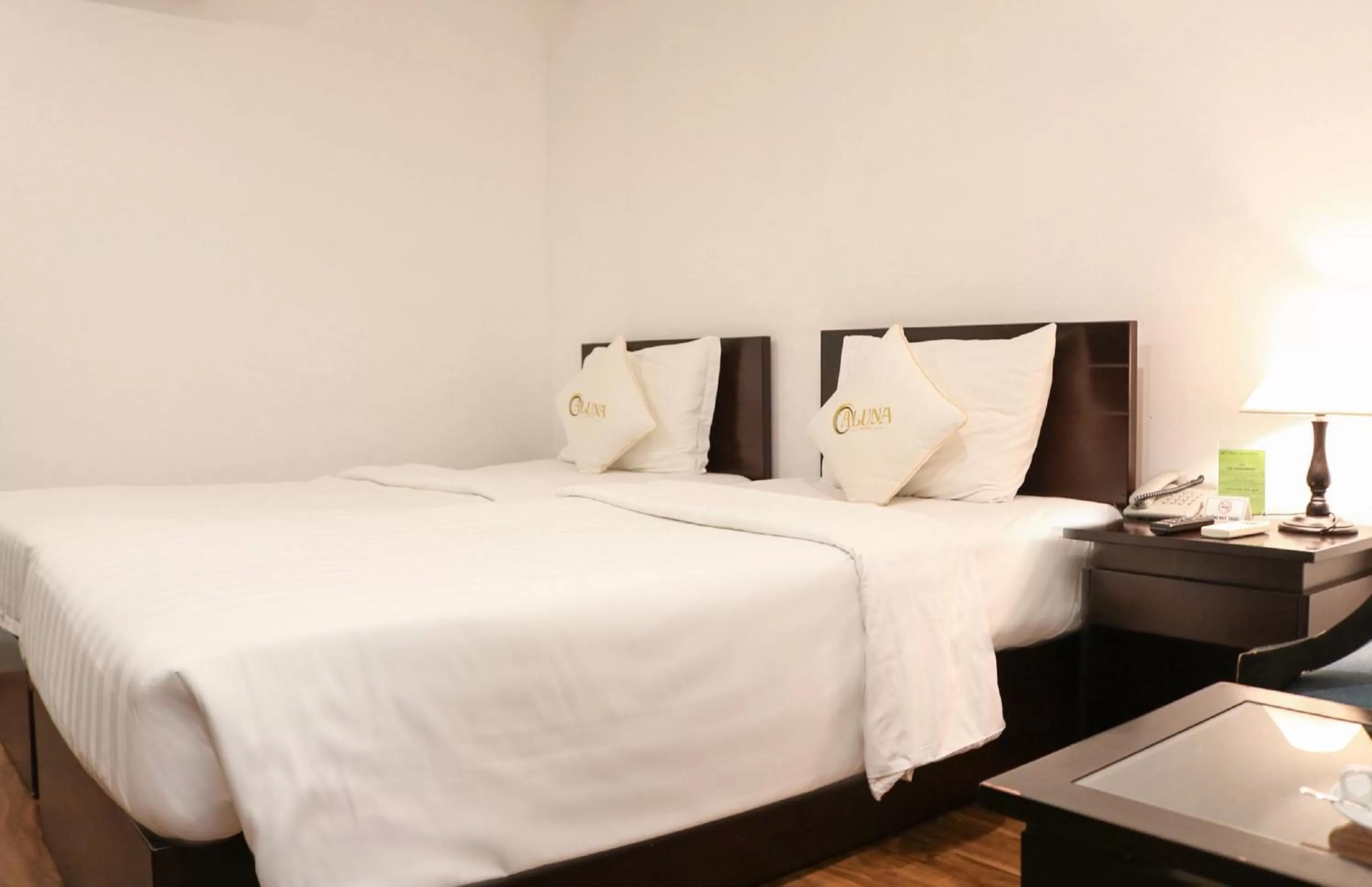 Bed in ALUNA Ben Thanh Hotel