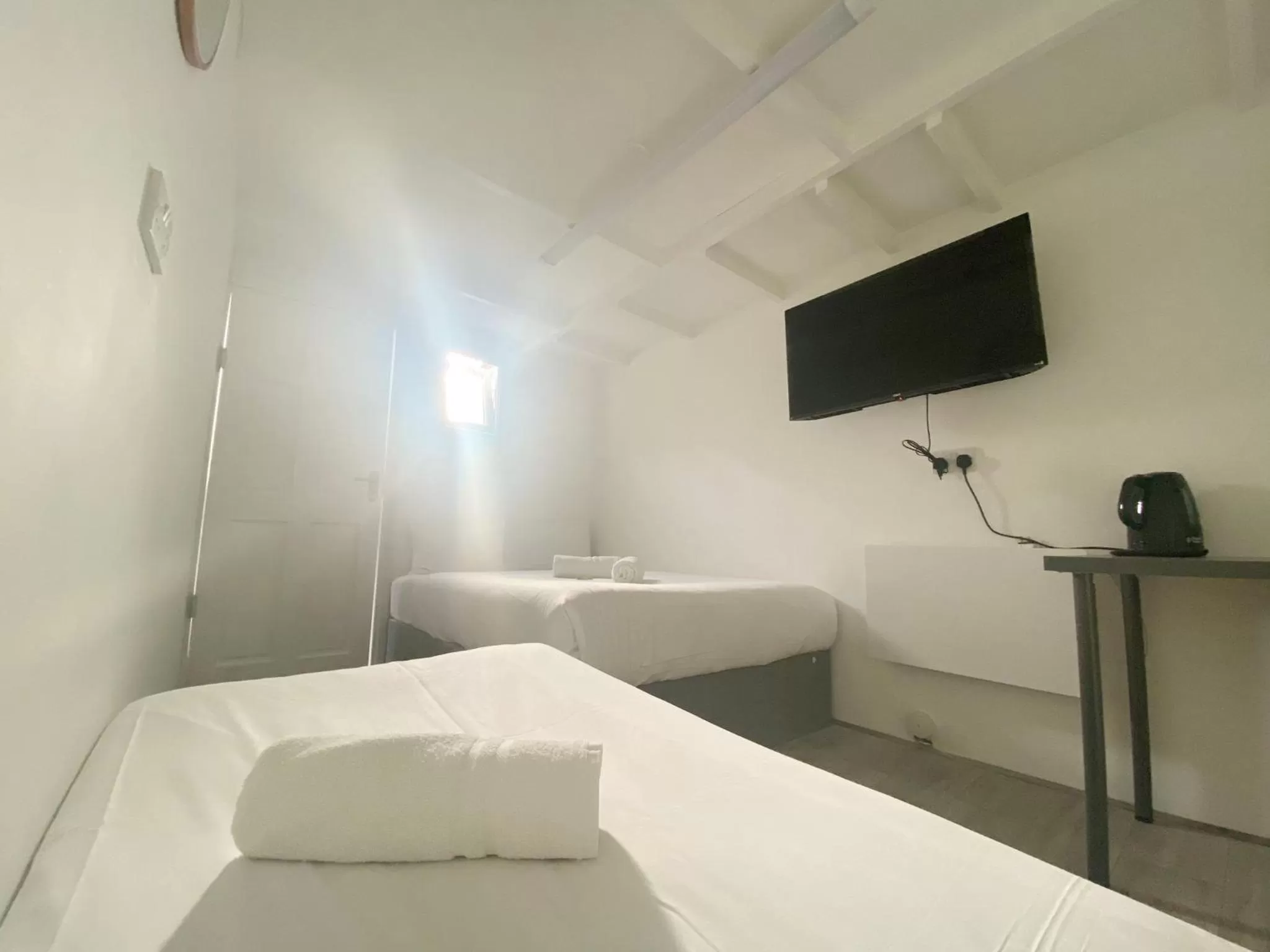 Bed in Anchor Guest House