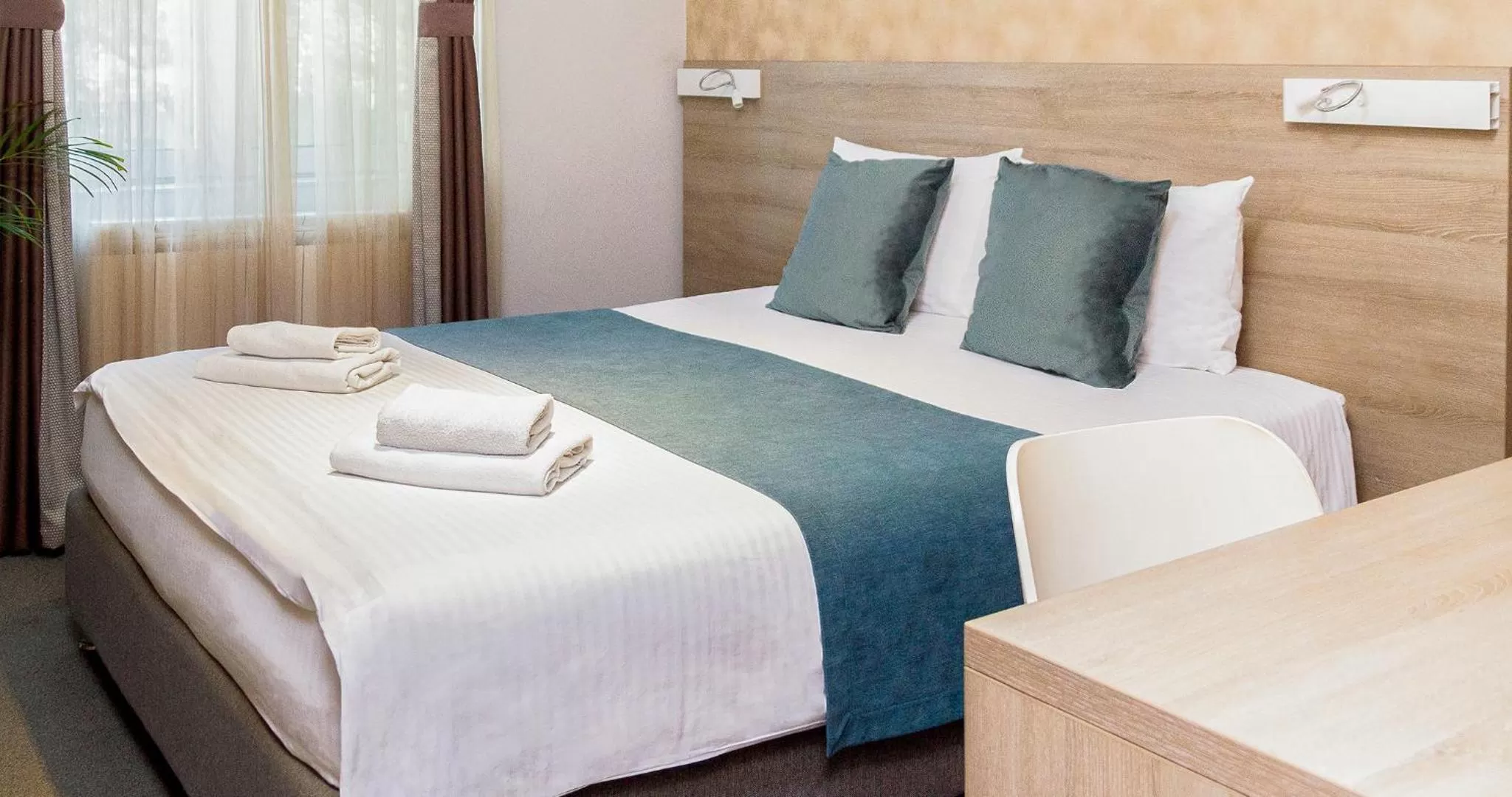 Photo of the whole room, Bed in Garni Hotel Mint