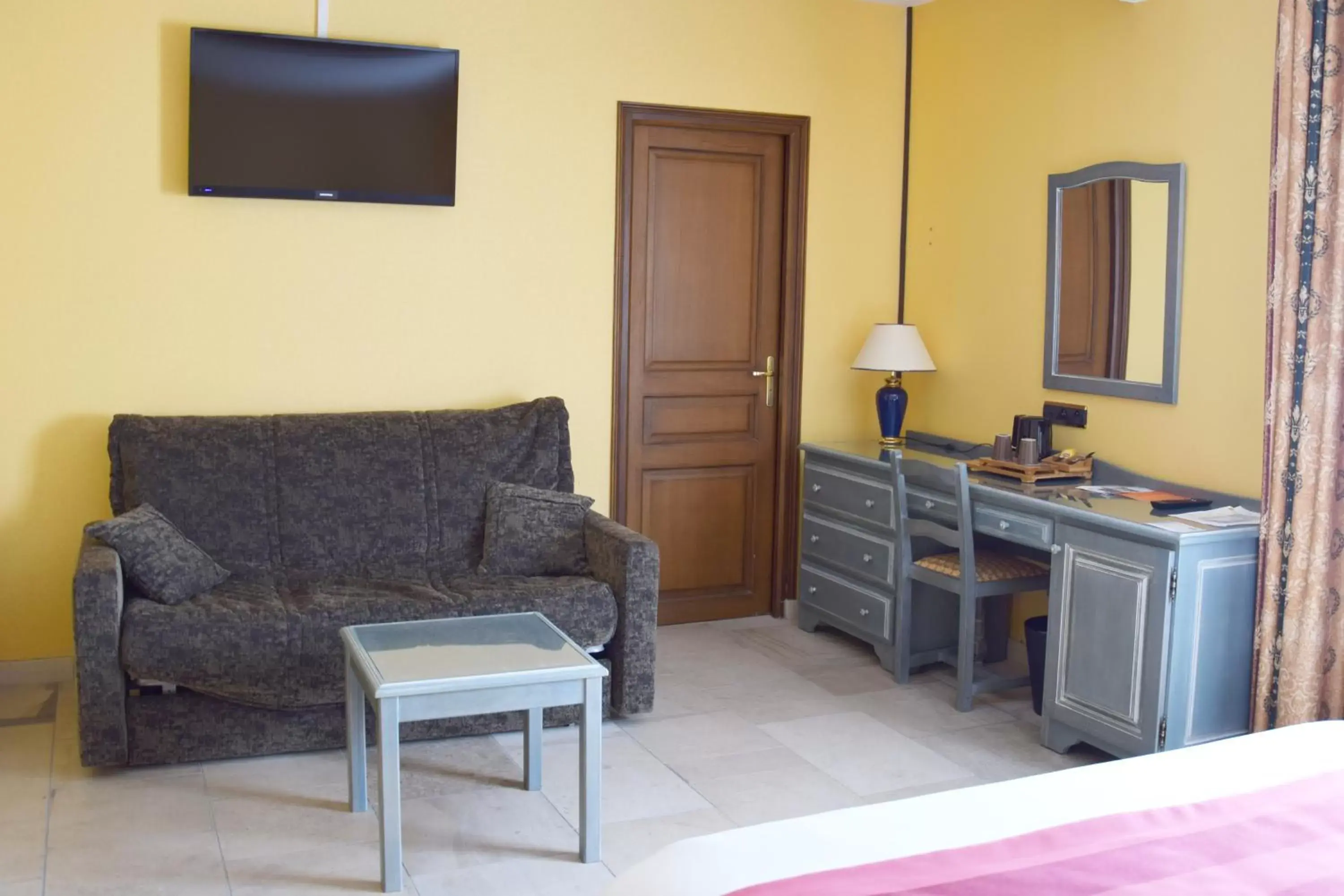 Bedroom, Seating Area in Logis Le Saint Nicolas