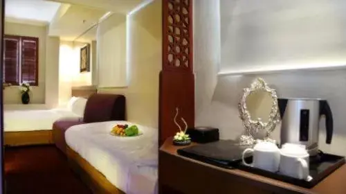 Bedroom in Oriental Lander Hotel