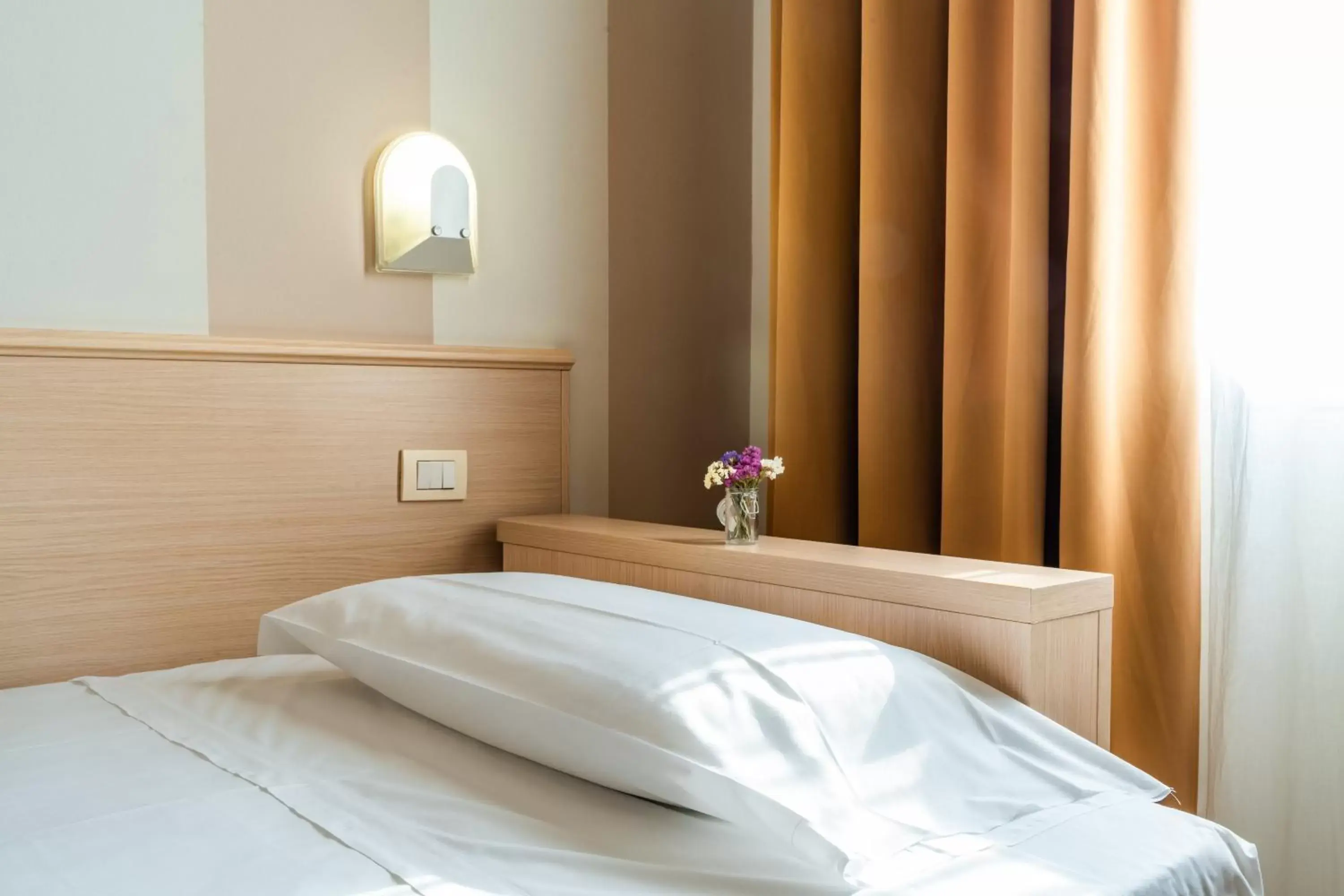 Bed in Hotel Mirandola