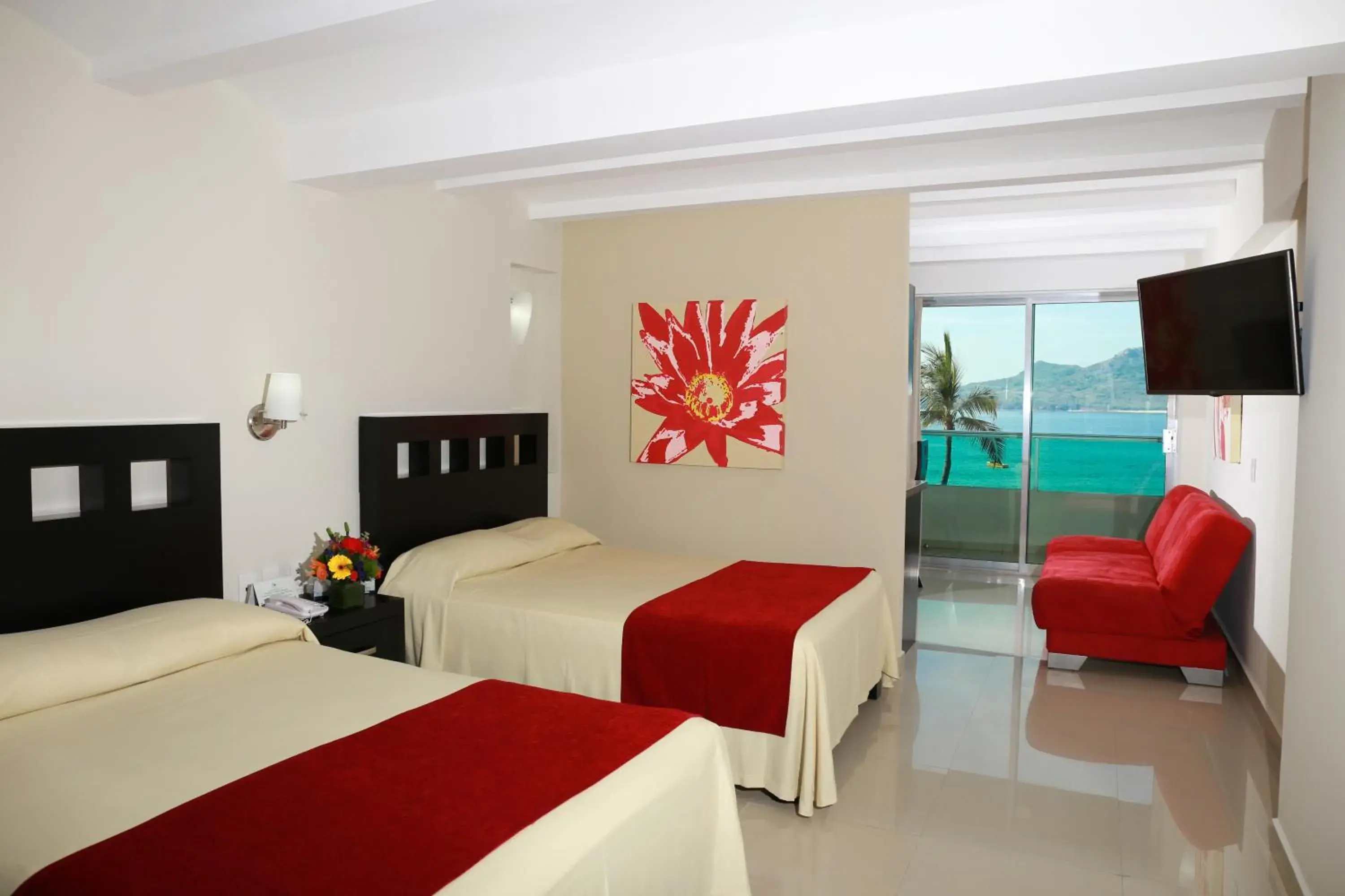 Photo of the whole room, Bed in Las Flores Beach Resort