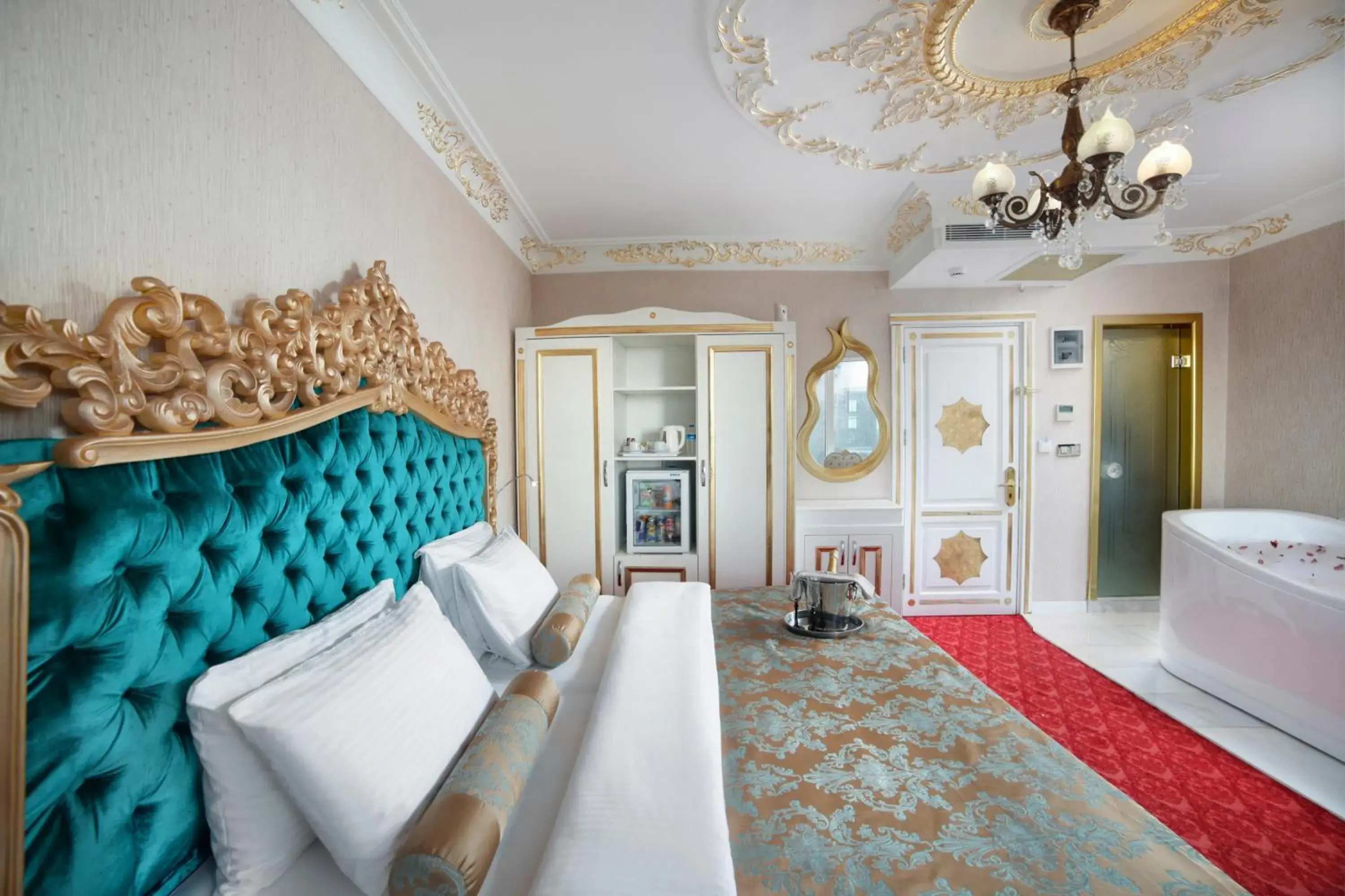 Bed in White Monarch Hotel Bed in White Monarch Hotel