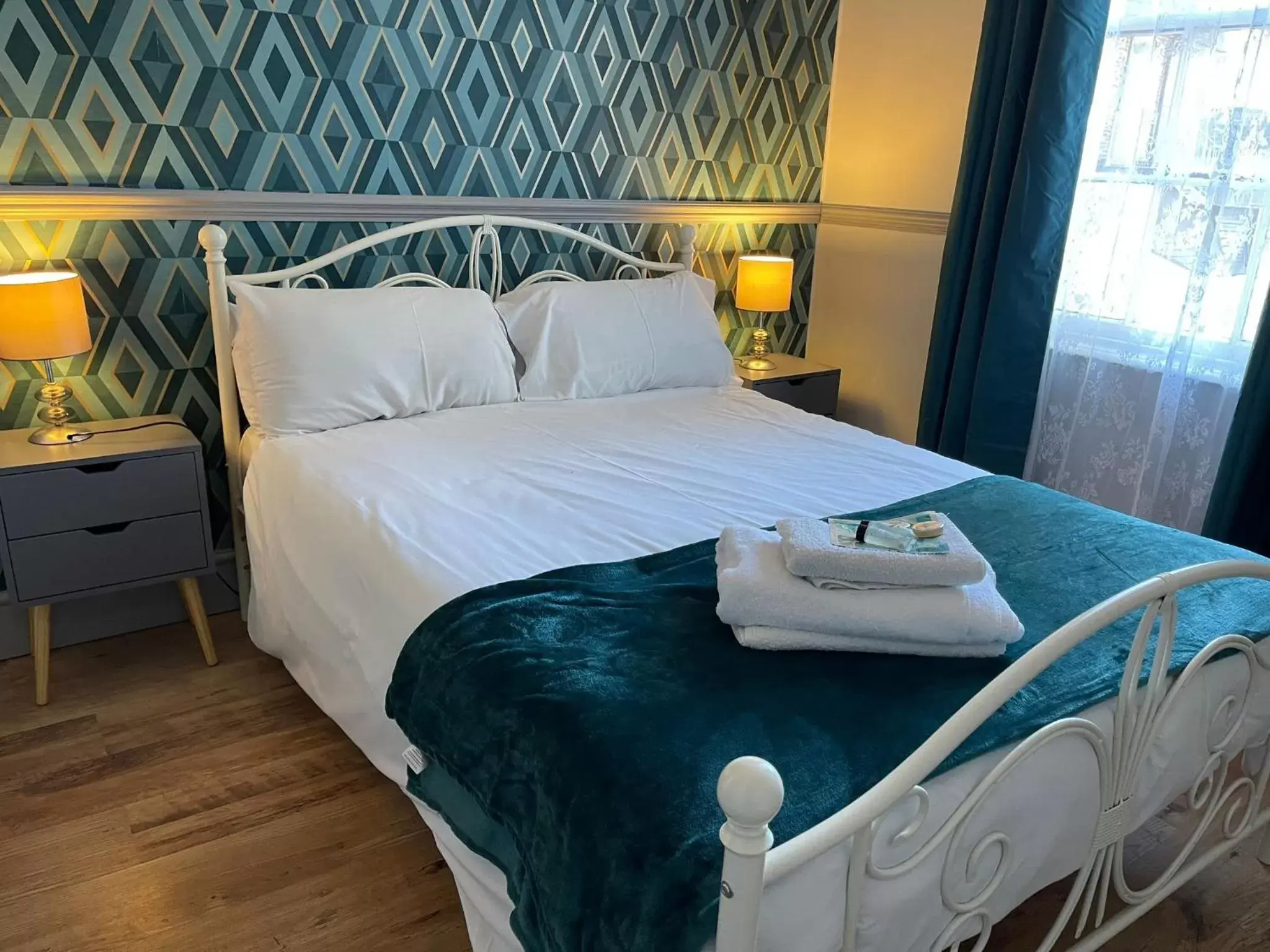 Bed in LilyRose Hotel