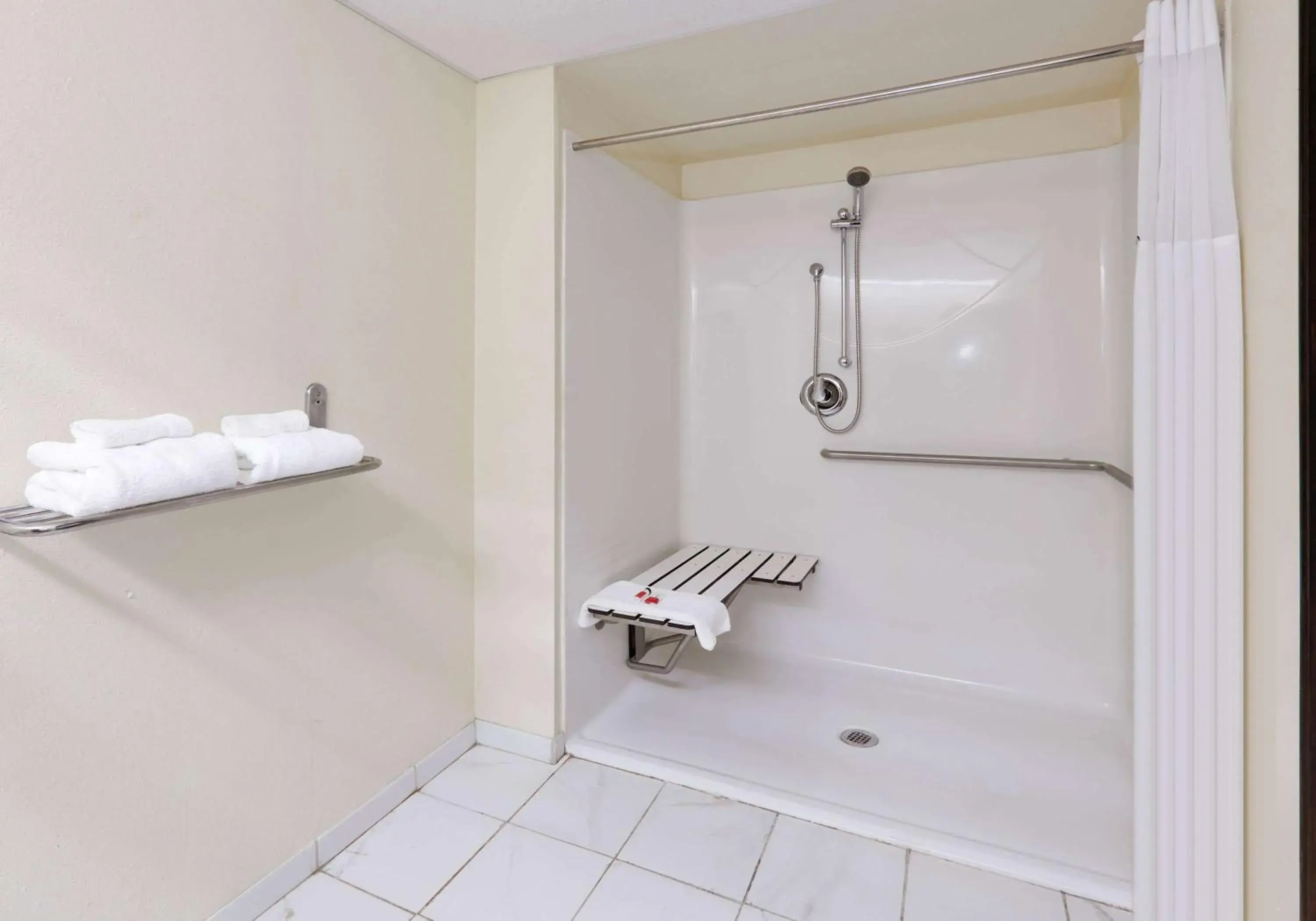 Shower, Bathroom in Days Inn & Suites by Wyndham Bentonville