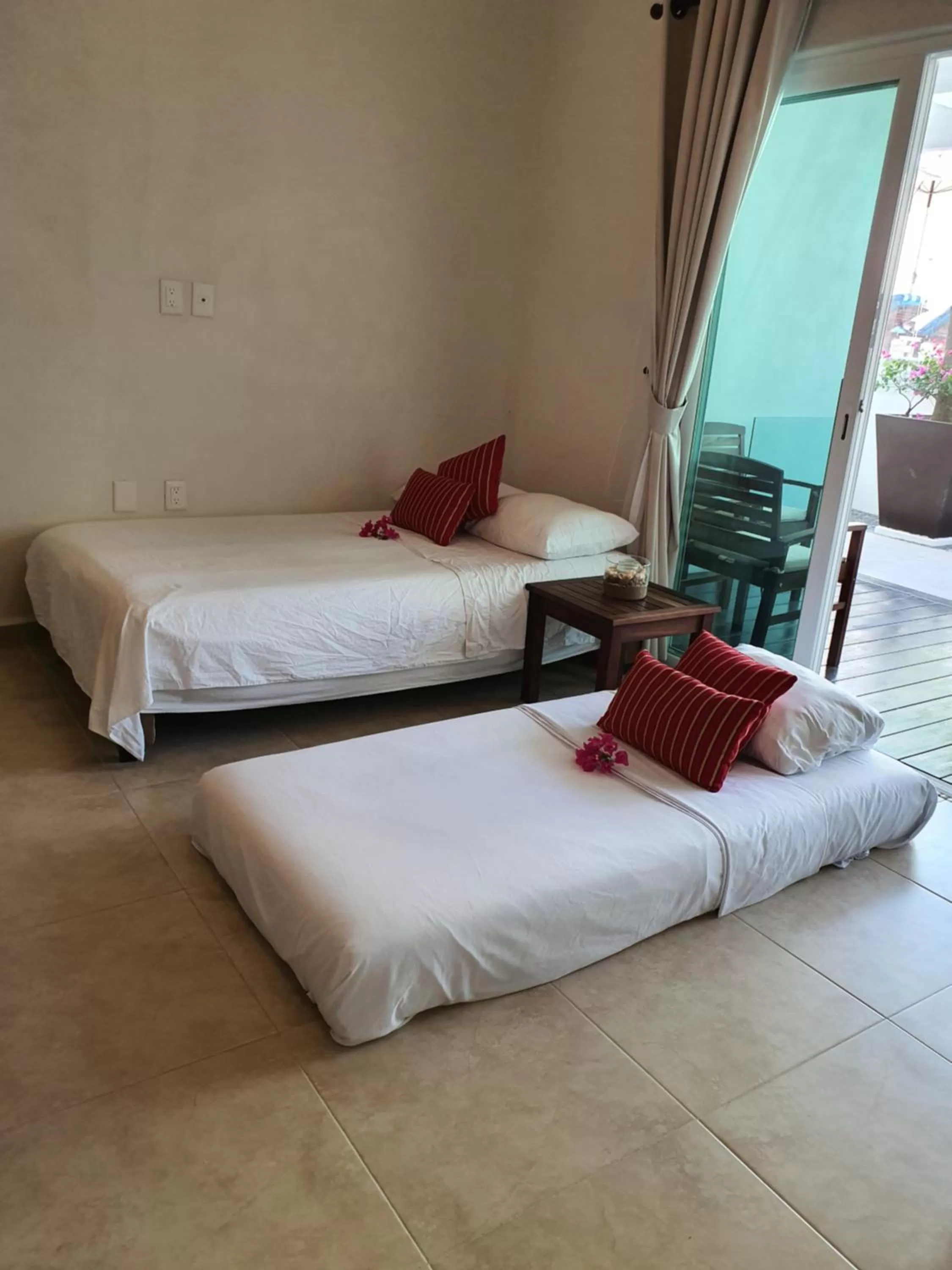 Bed in LYDMAR BOUTIQUE HOTEL