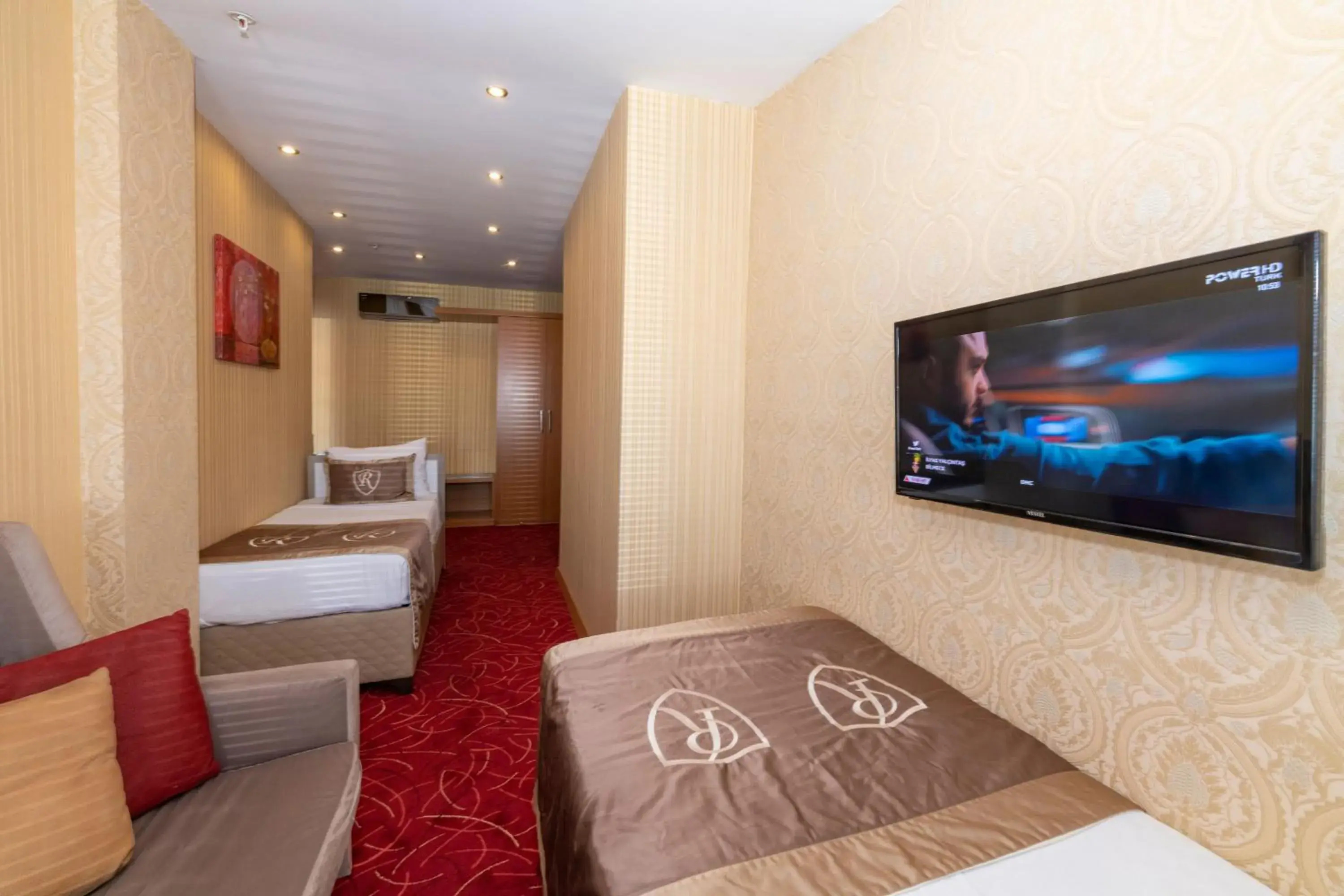 Bed, TV/Entertainment Center in Regno Hotel