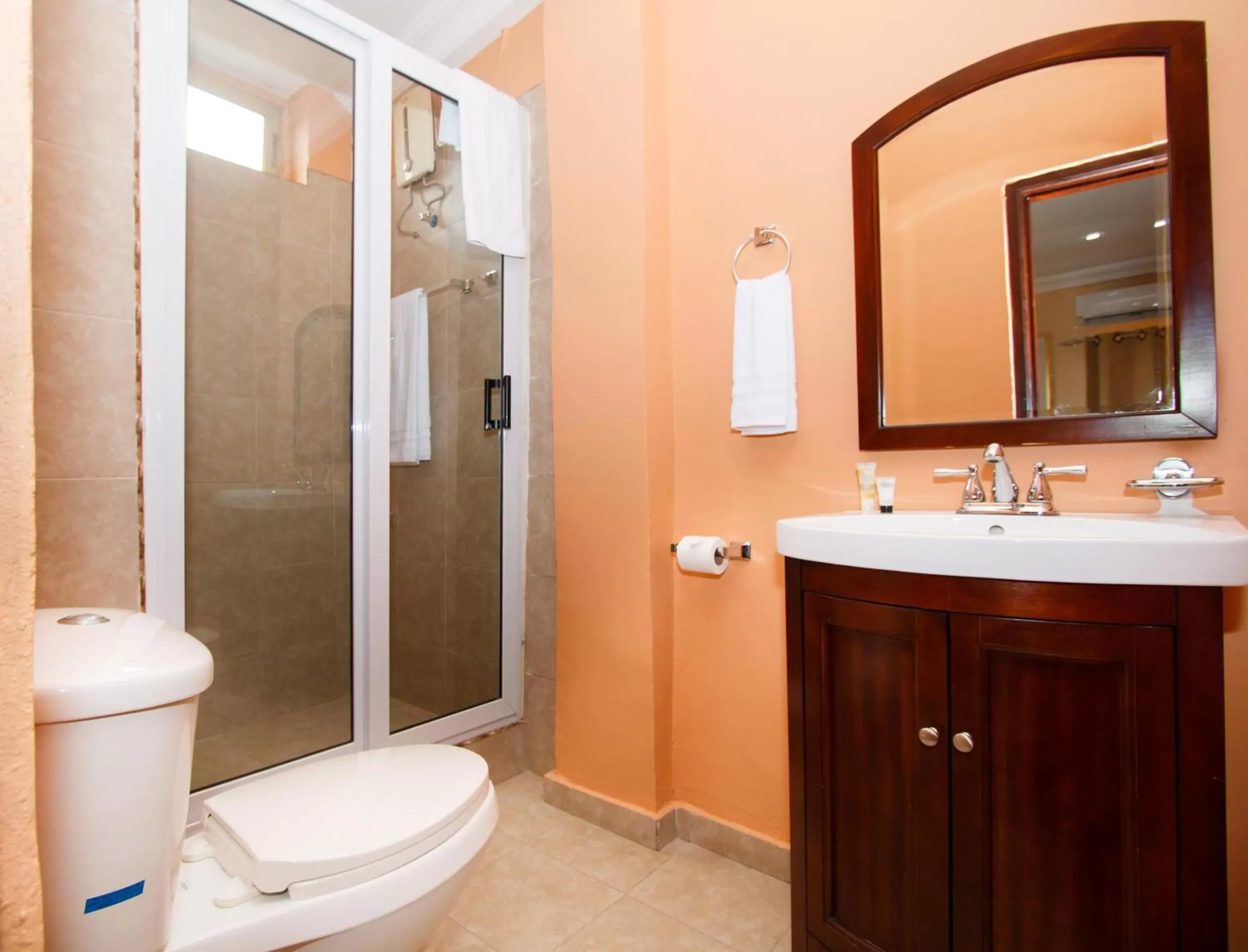 Toilet, Bathroom in Prestige Suites