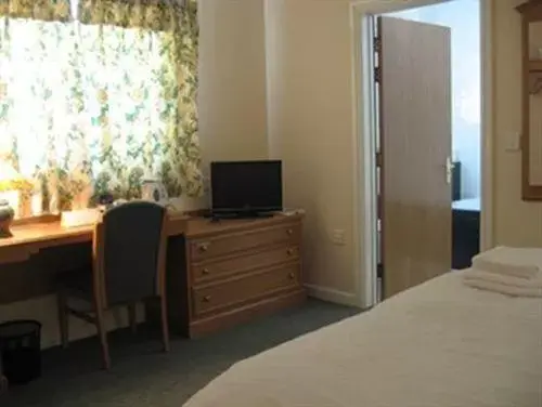 Bedroom, TV/Entertainment Center in Hazelwood House