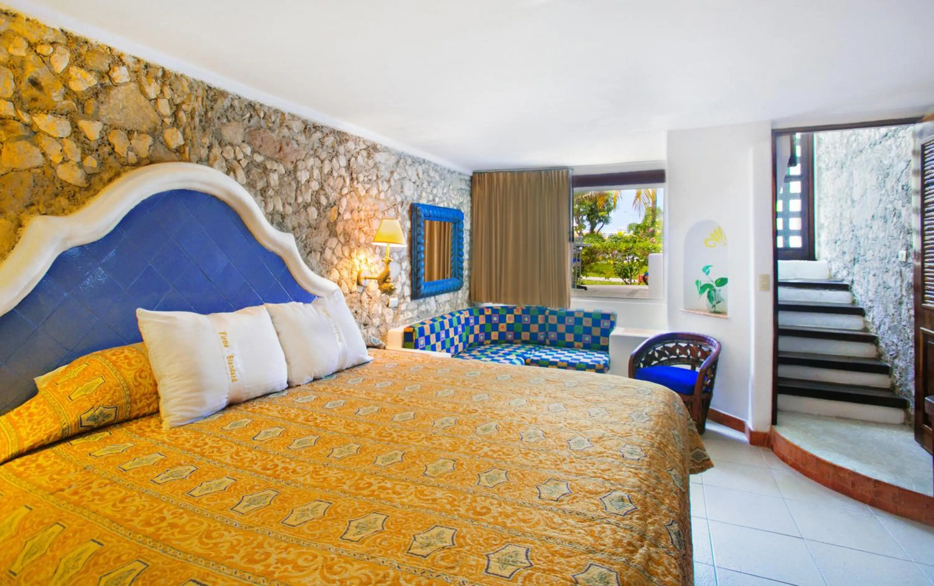 Bedroom, Bed in Casa del Mar Cozumel Hotel & Dive Resort with free access to an exclusive beach club