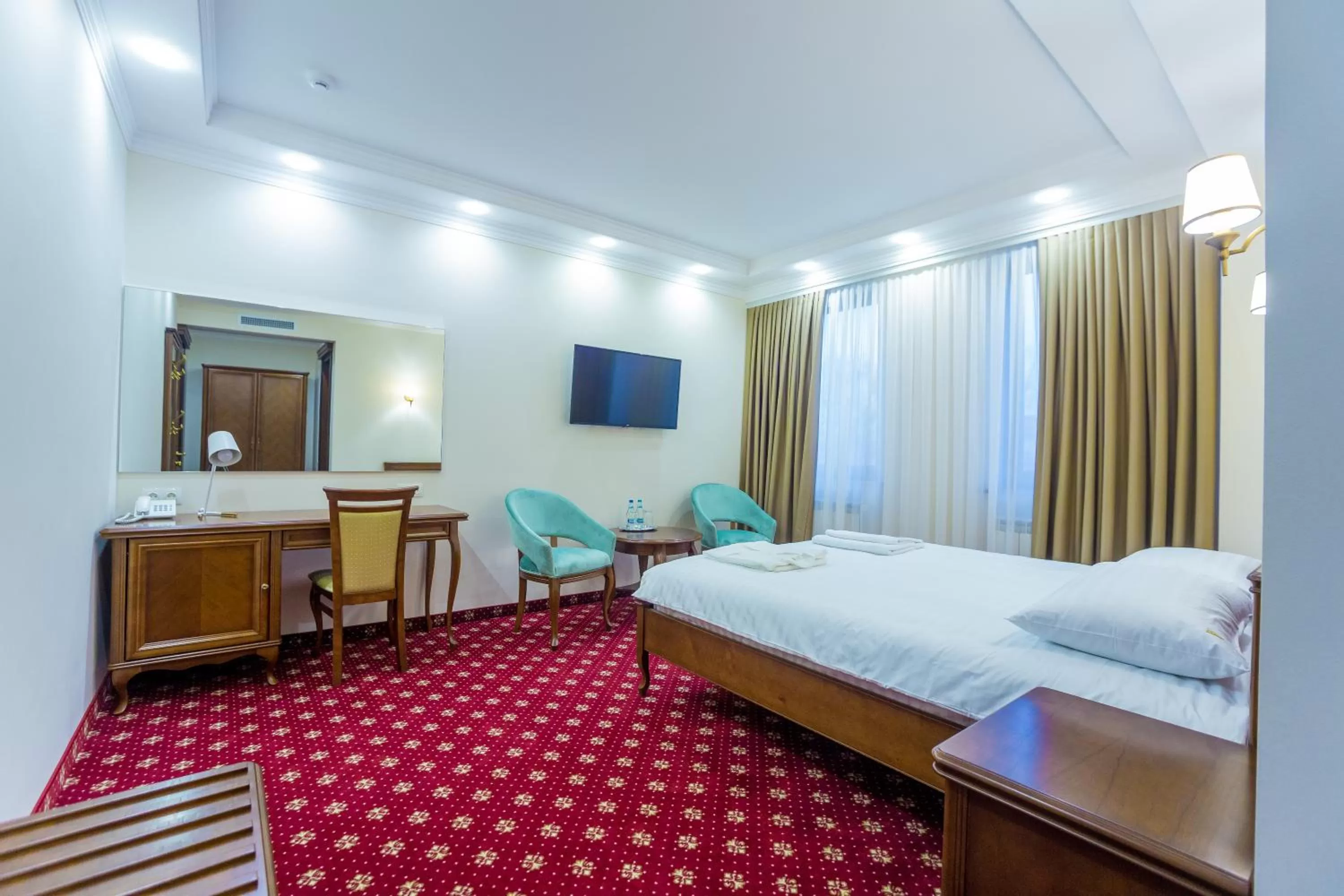 Photo of the whole room, Bed in Ambassador Hotel