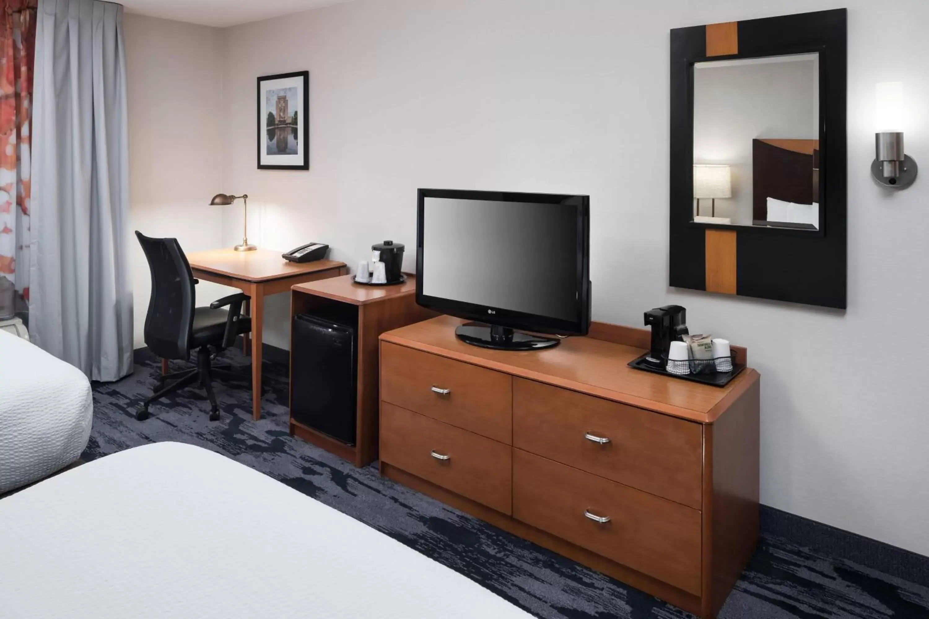 Photo of the whole room, TV/Entertainment Center in Fairfield Inn & Suites South Bend at Notre Dame