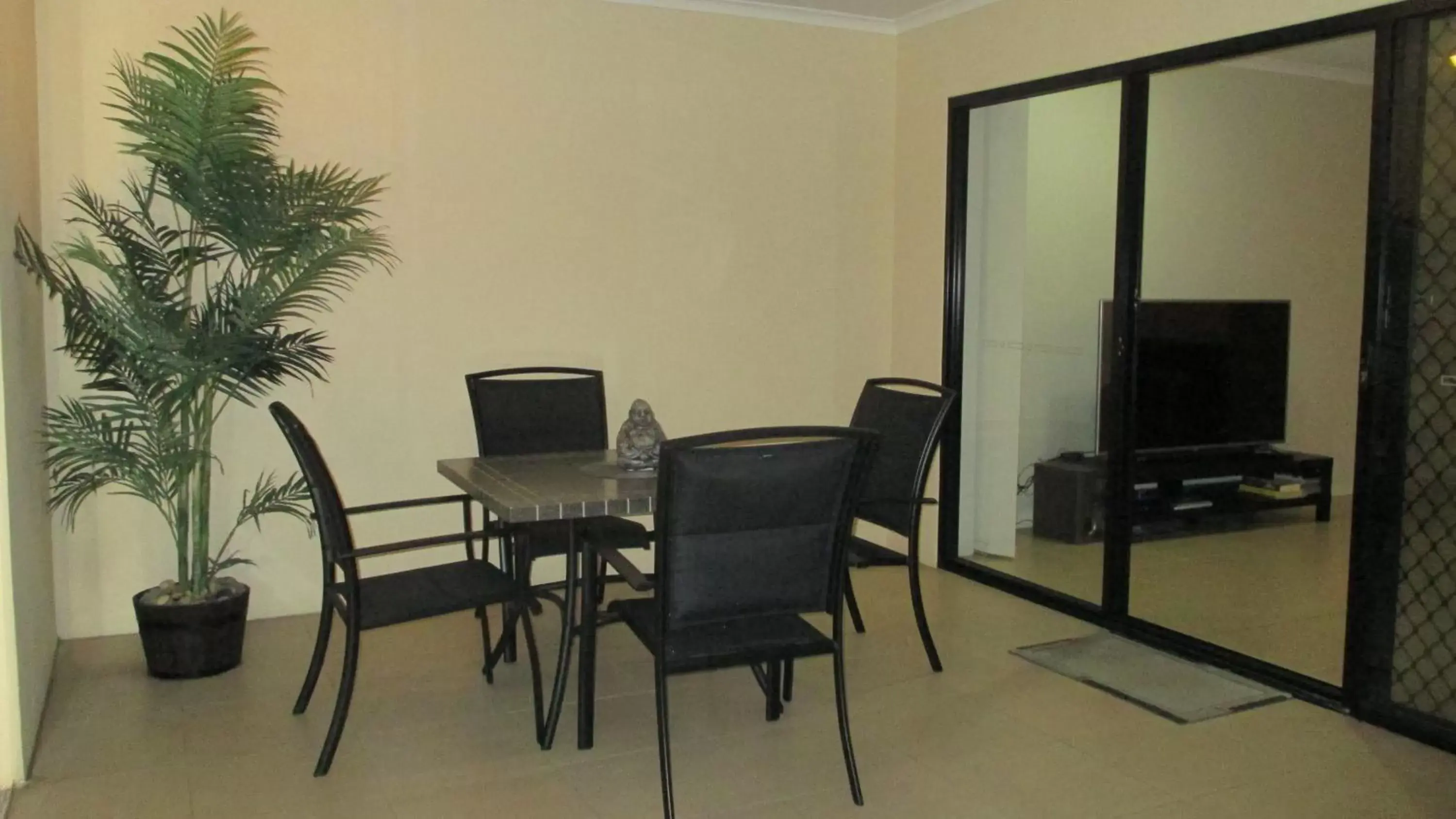 Balcony/Terrace, TV/Entertainment Center in Edge Apartments Cairns