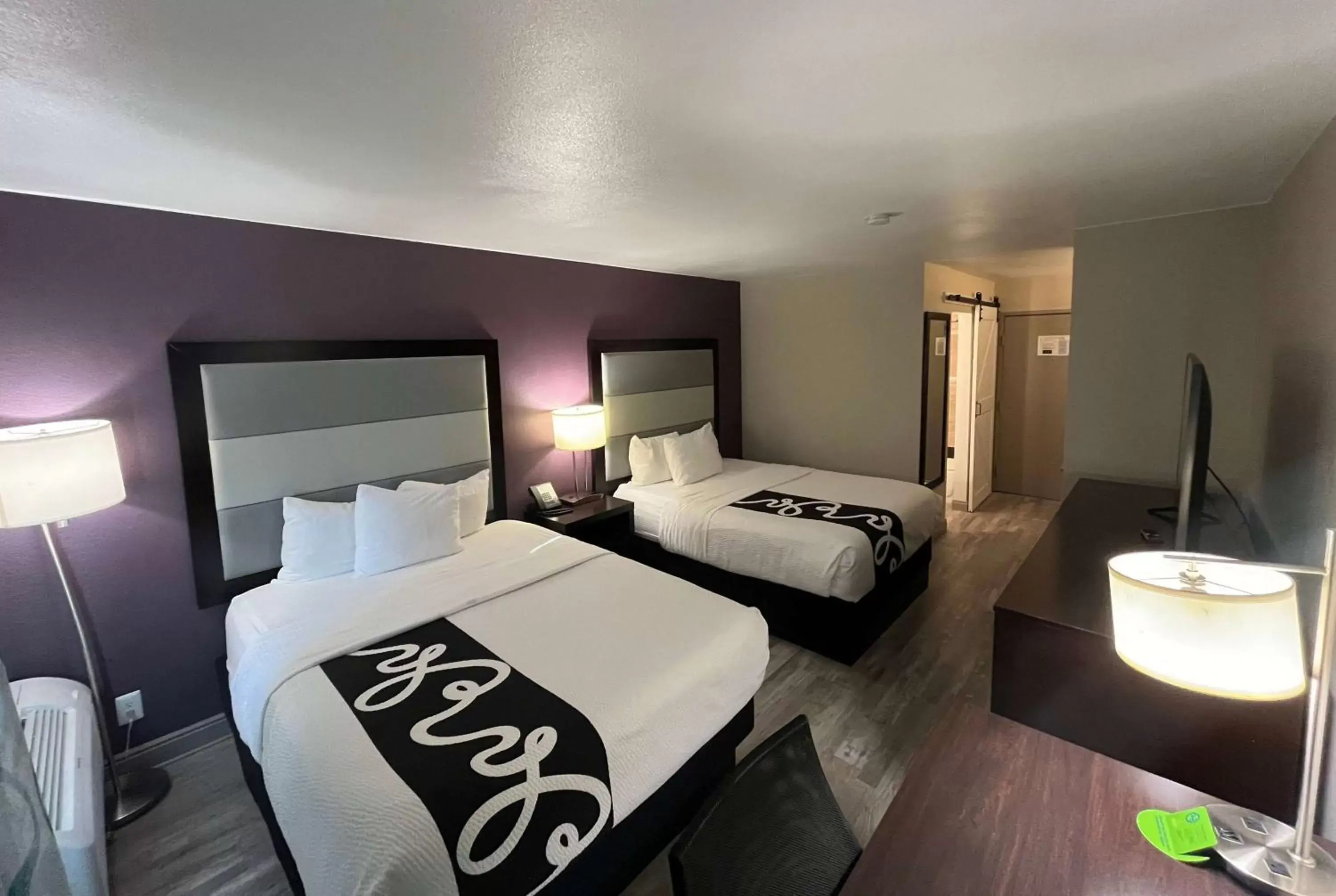 Bed in La Quinta Inn & Suites by Wyndham Fort Collins, Colorado