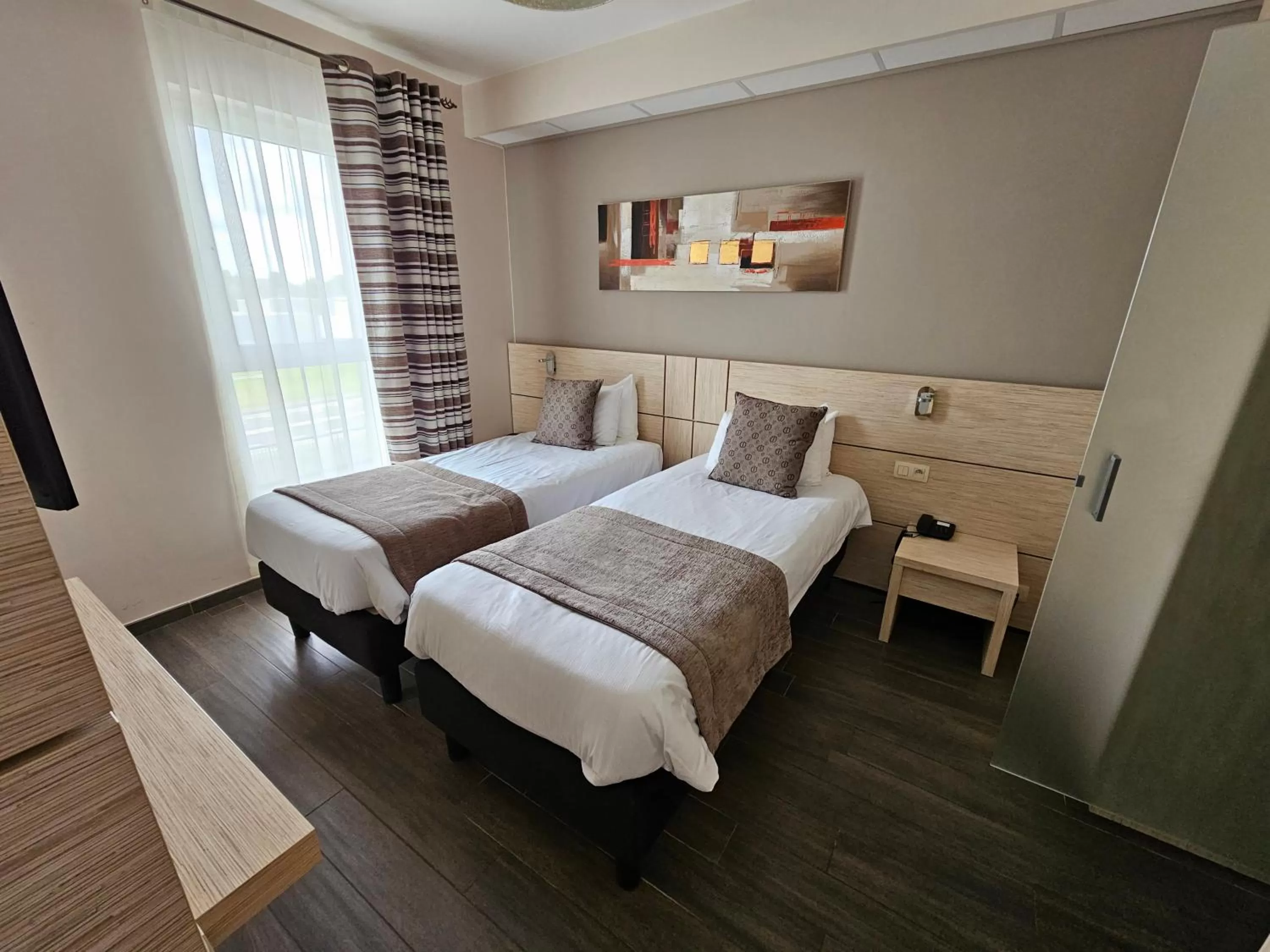 Bed in Ibis Styles Charleroi Airport Aero 44