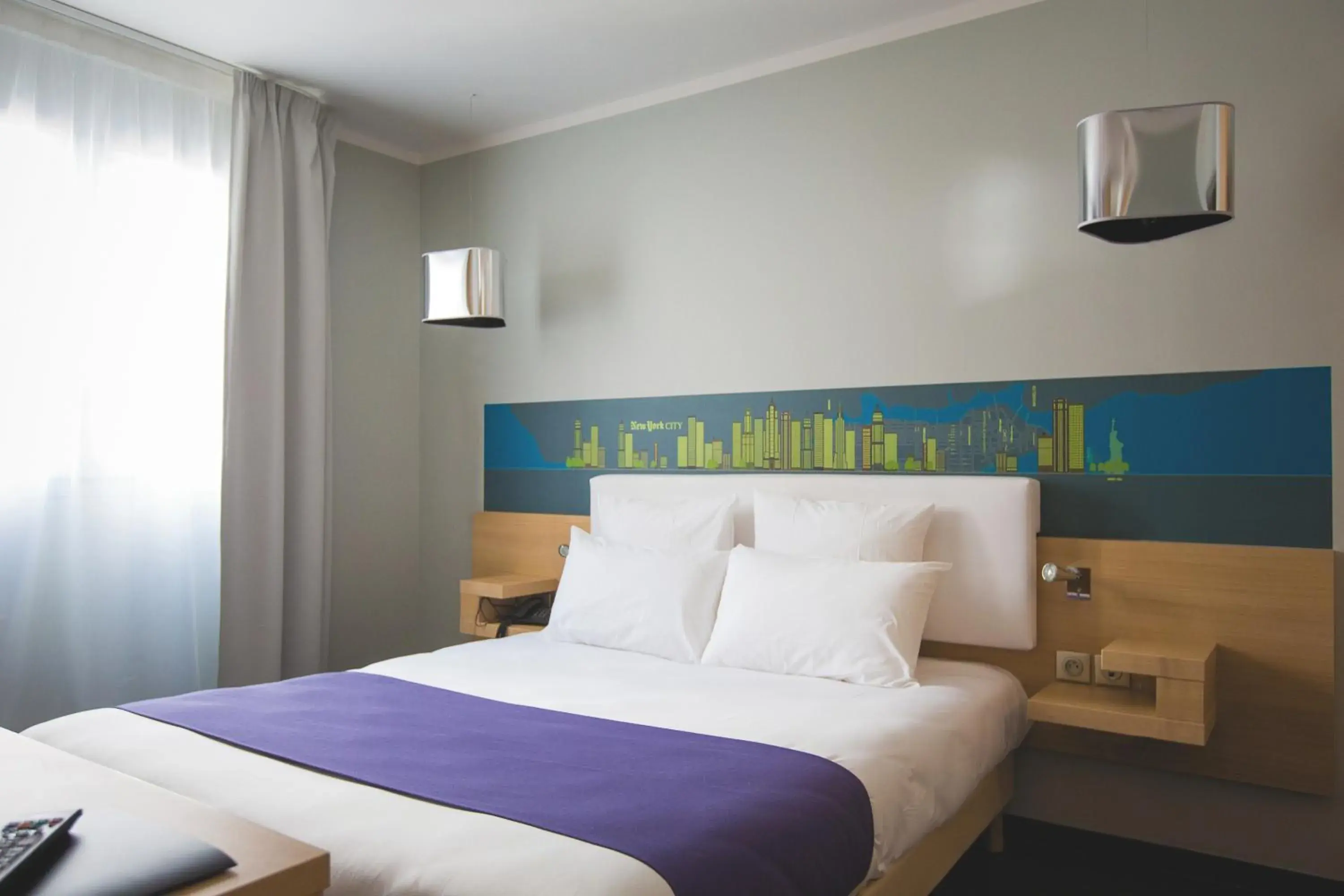 Bed in Park & Suites Elegance Lyon - Cite Internationale