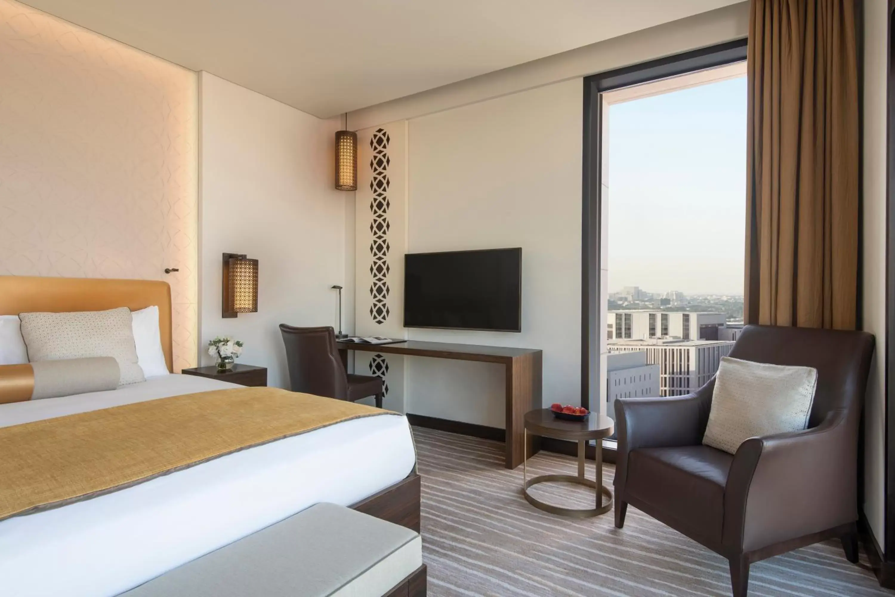 Bedroom, TV/Entertainment Center in Alwadi Hotel Doha - MGallery