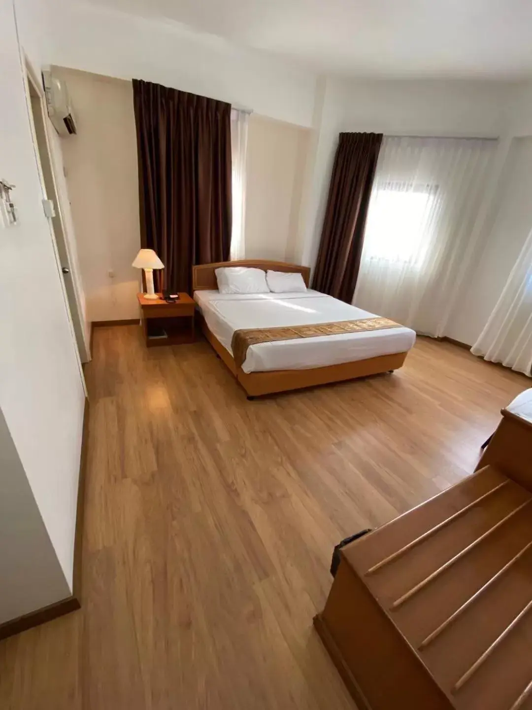 Bed in Kawan Hotel