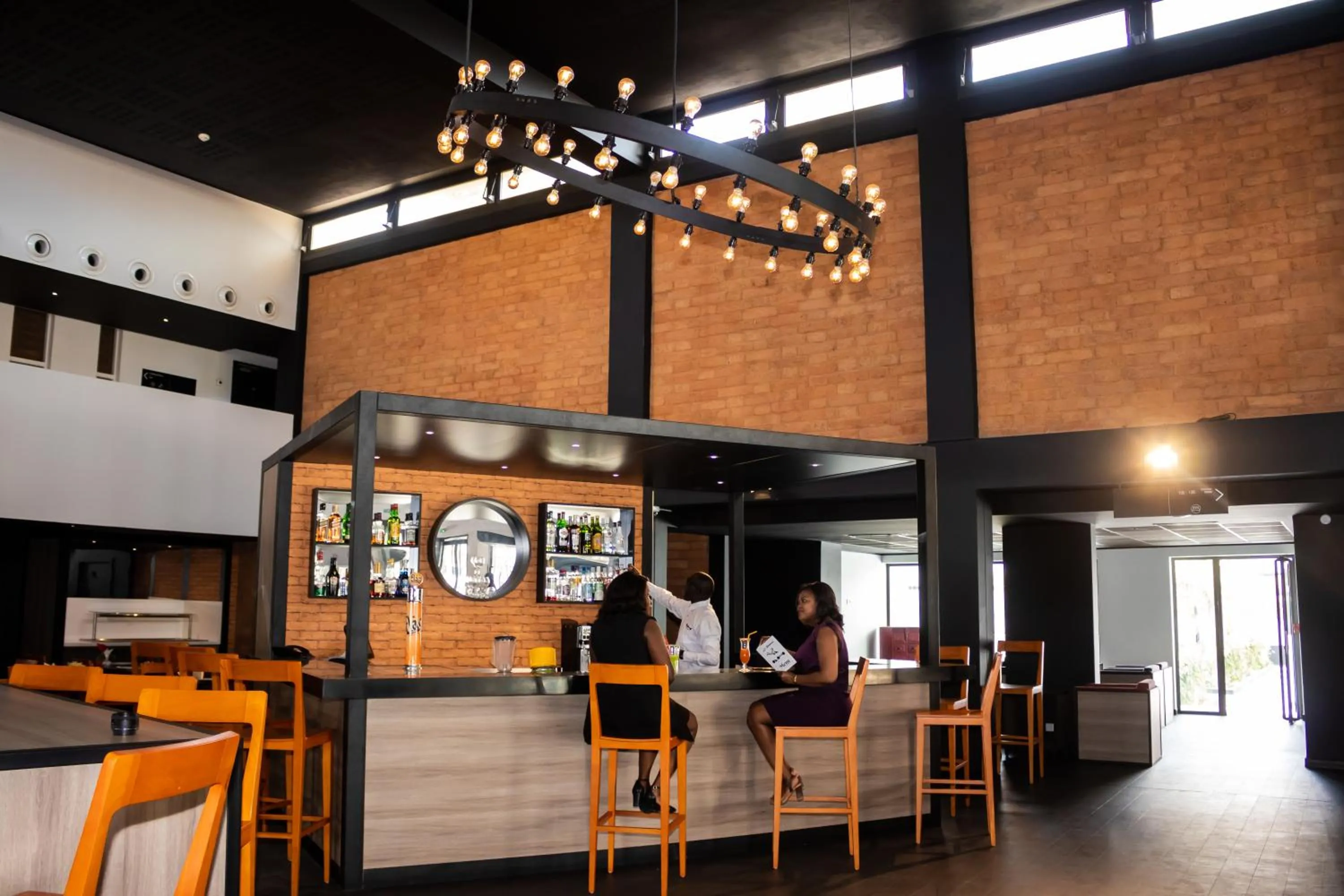 Lounge or bar in ONOMO Hotel Dakar