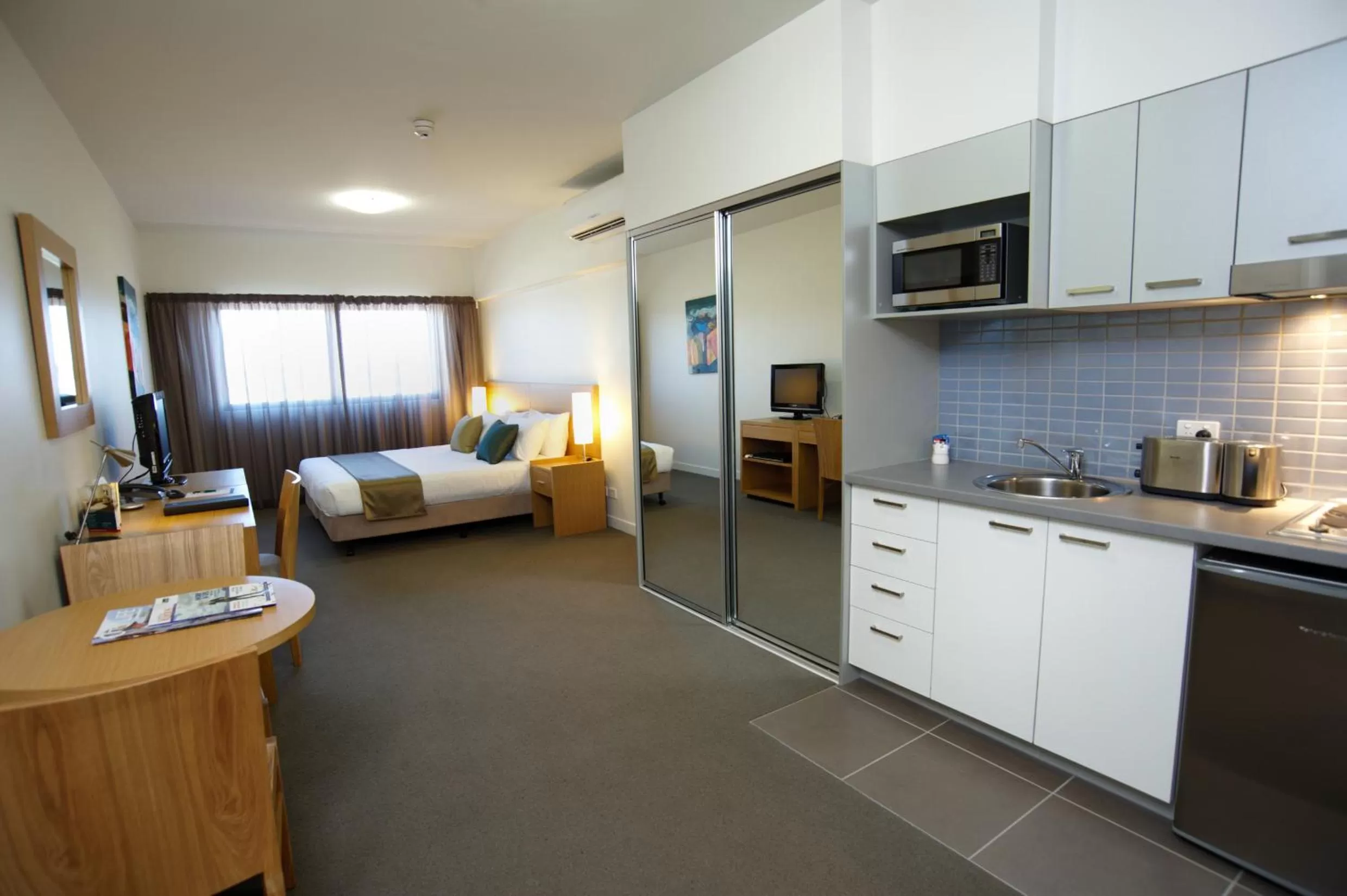 Living room, Bed in Aligned Corporate Residences Mackay