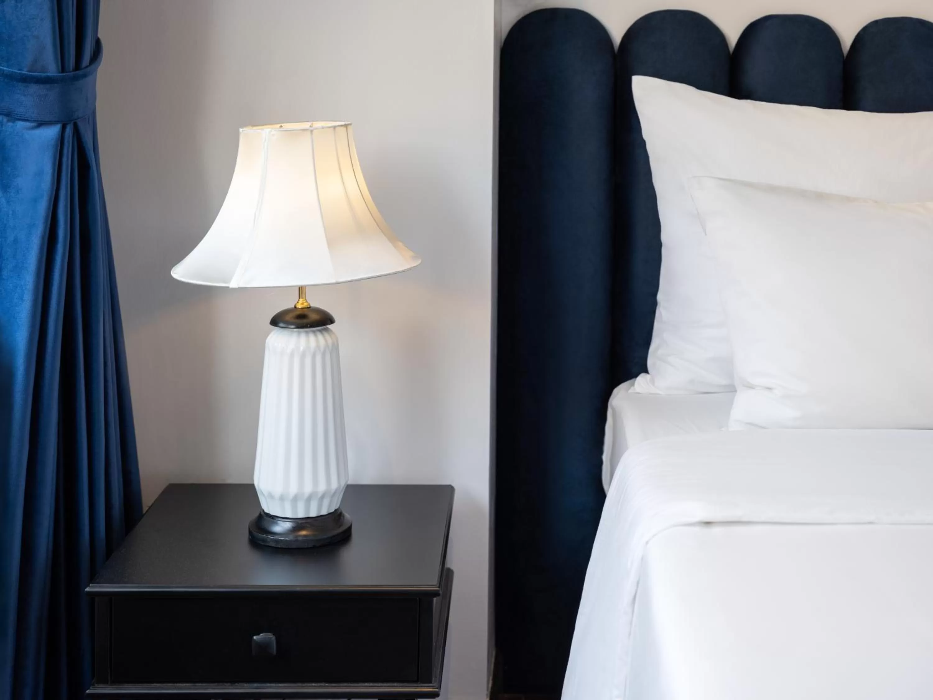 Bed in The Flower Boutique Hotel & Travel