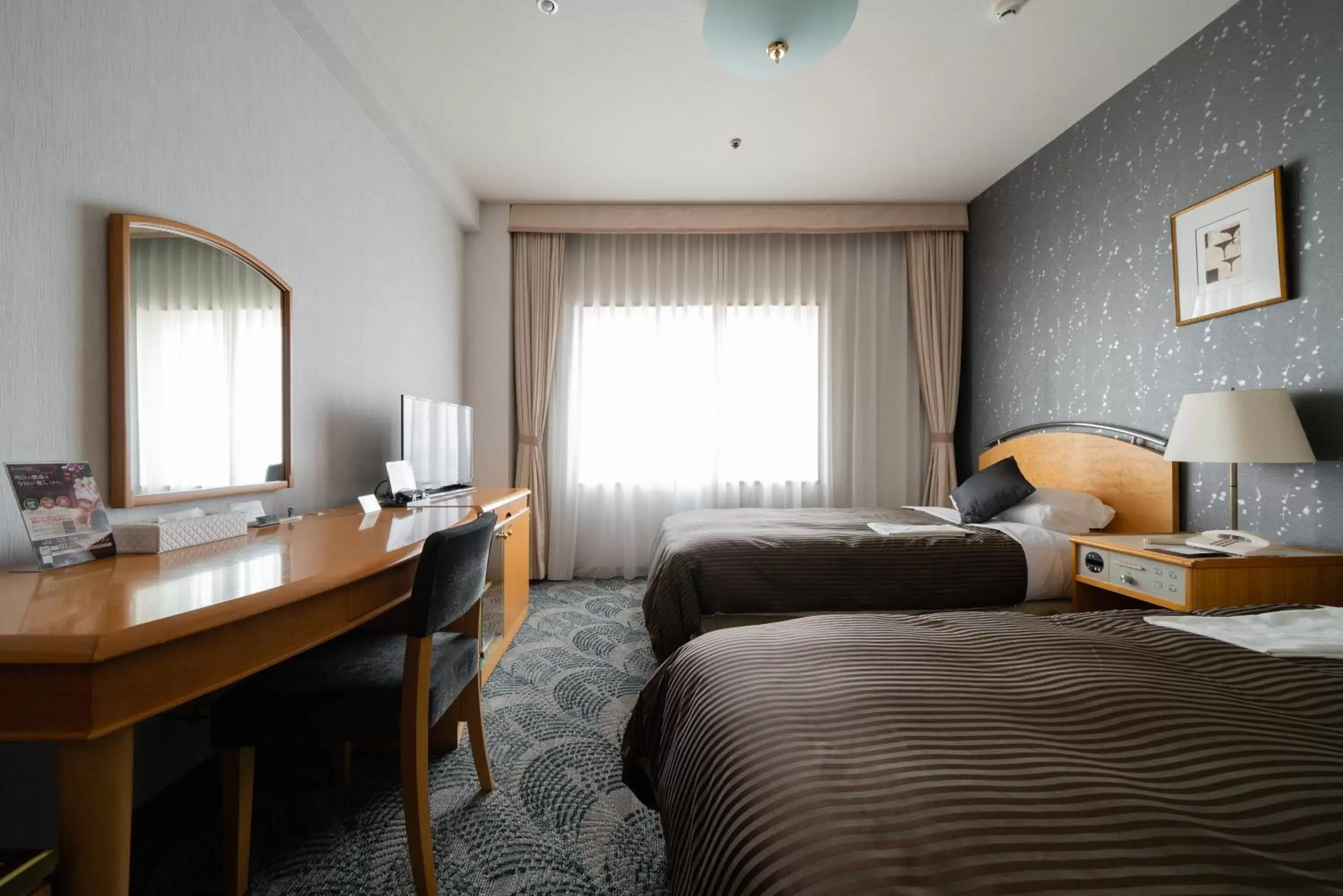 Bed in Hotel Okura Niigata