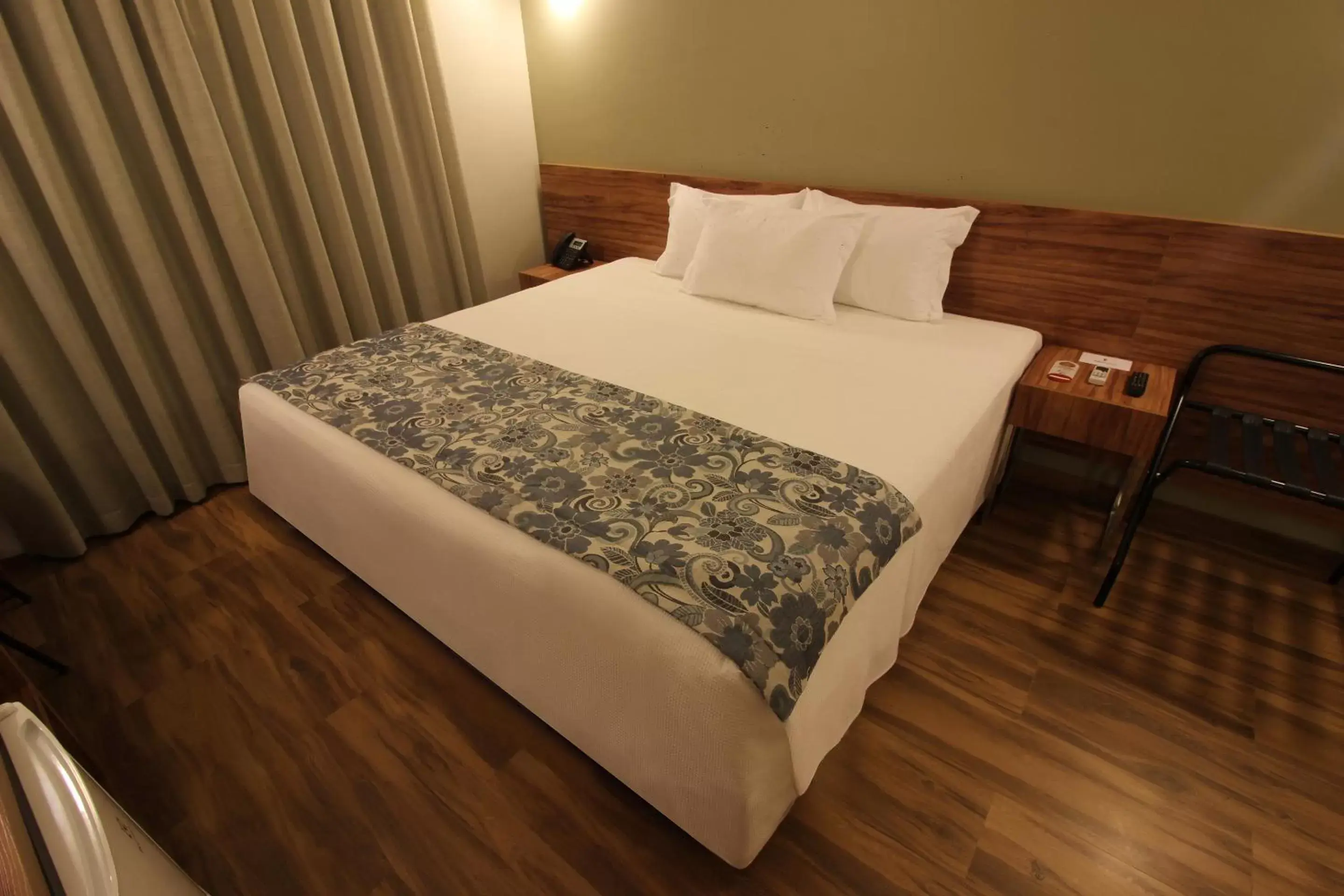 Bed in Impar Suites Barao de Cocais