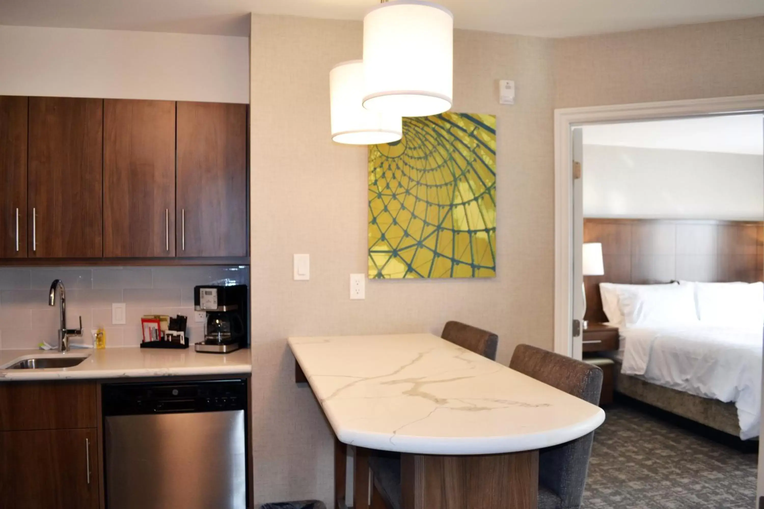 Photo of the whole room, Kitchen/Kitchenette in Staybridge Suites - Red Deer North, an IHG Hotel