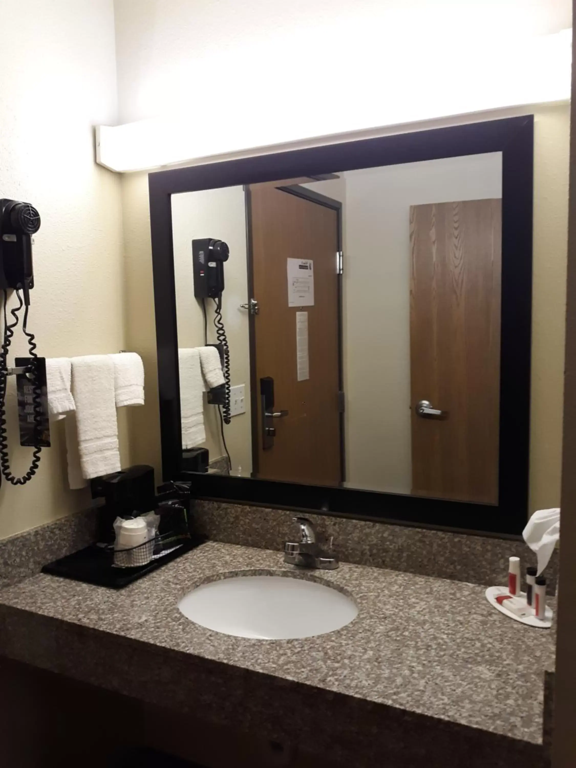 Bathroom in Super 8 by Wyndham Mound City