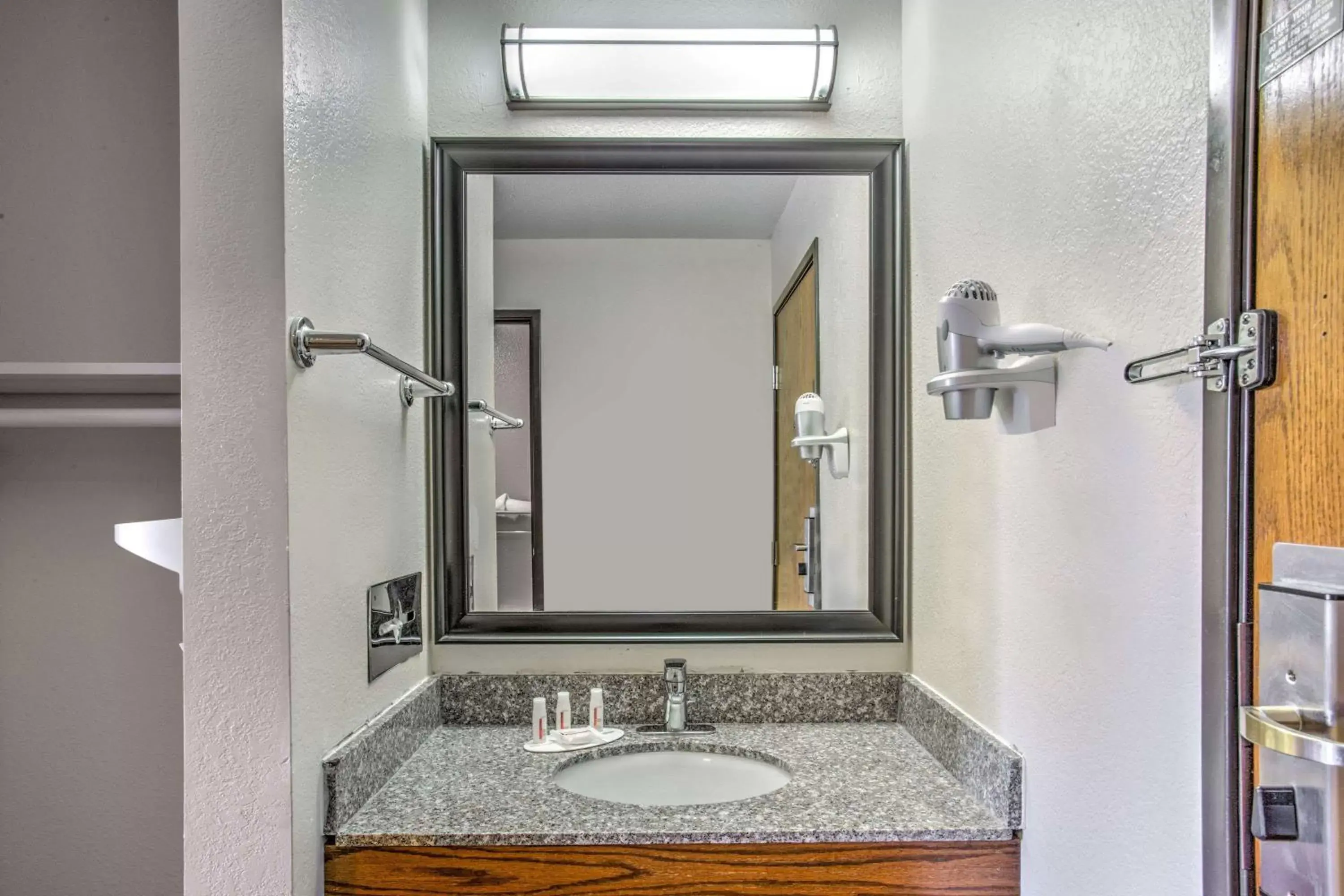 Bathroom in Days Inn by Wyndham Le Roy/Bloomington Southeast