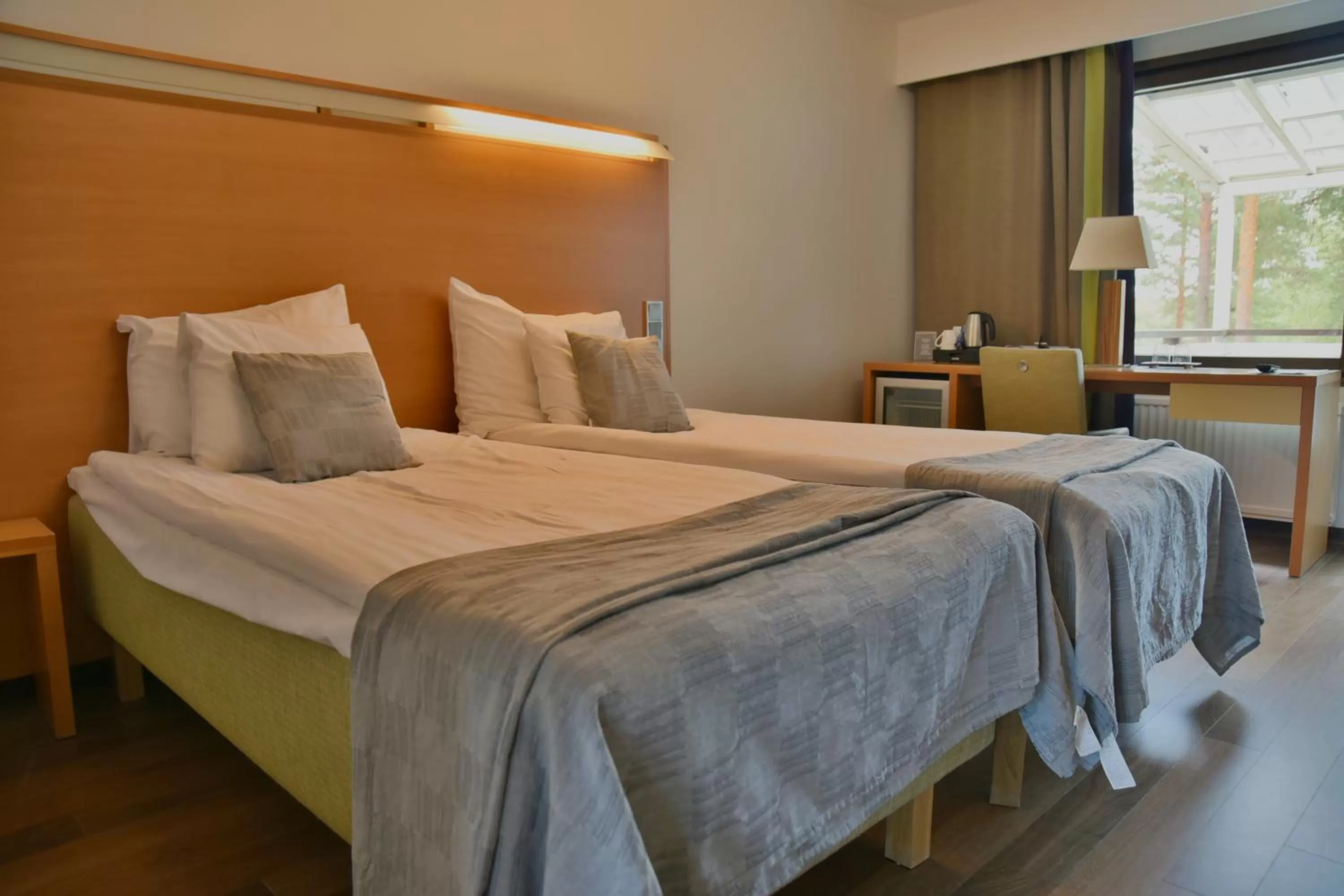 Bed in Saimaanranta Resort by Anttolanhovi