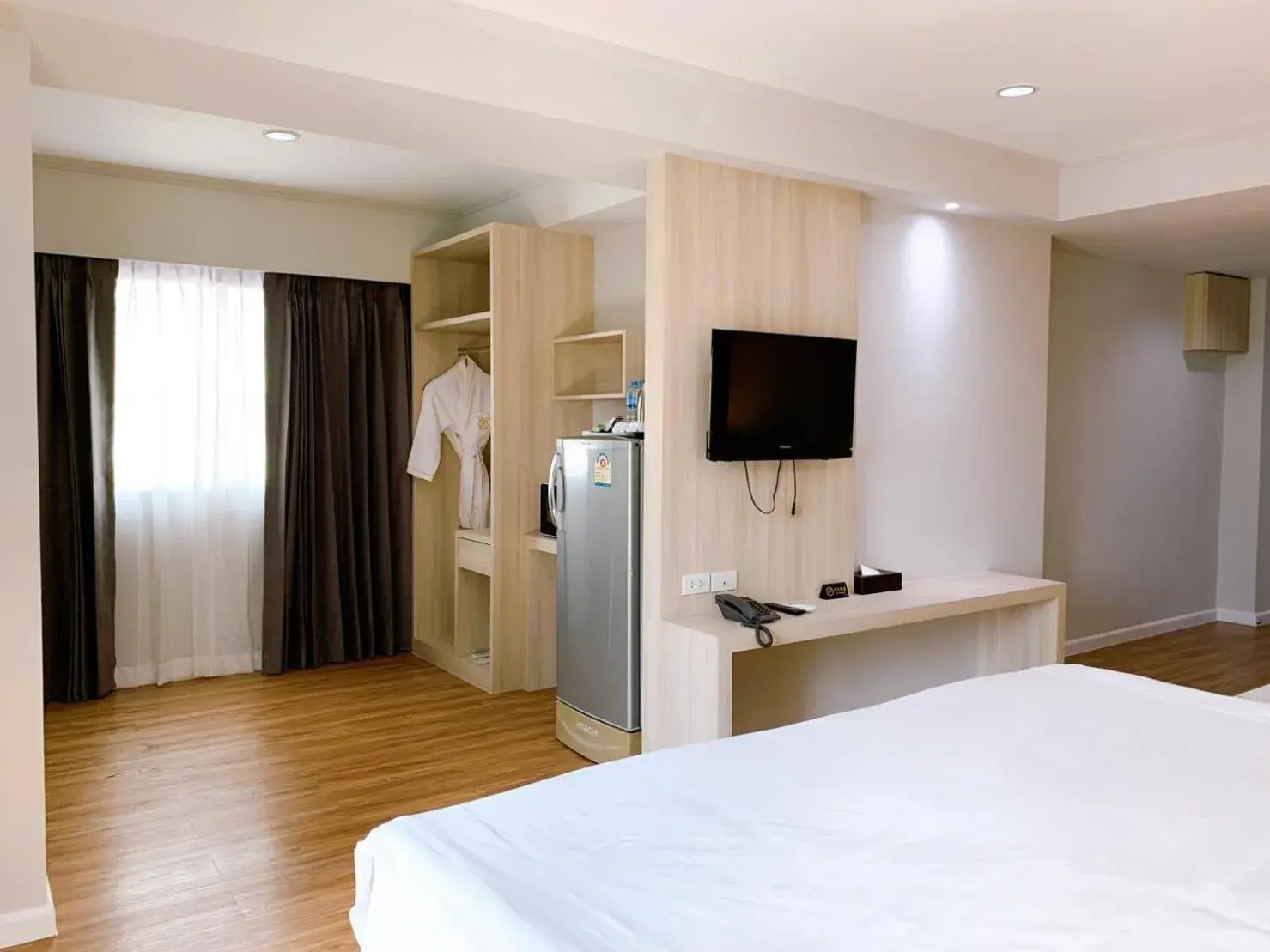 Bedroom, TV/Entertainment Center in Miloft Sathorn Hotel - SHA Plus Certified