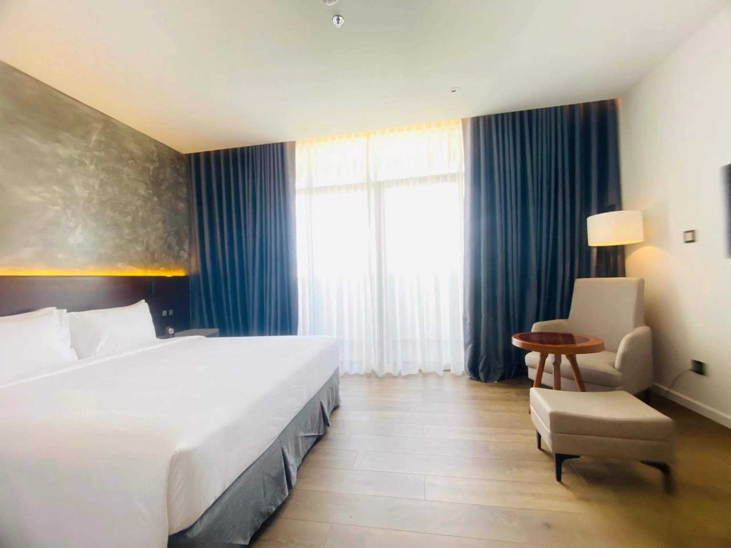 Bed in NEWCC HOTEL AND SERVICED APARTMENT