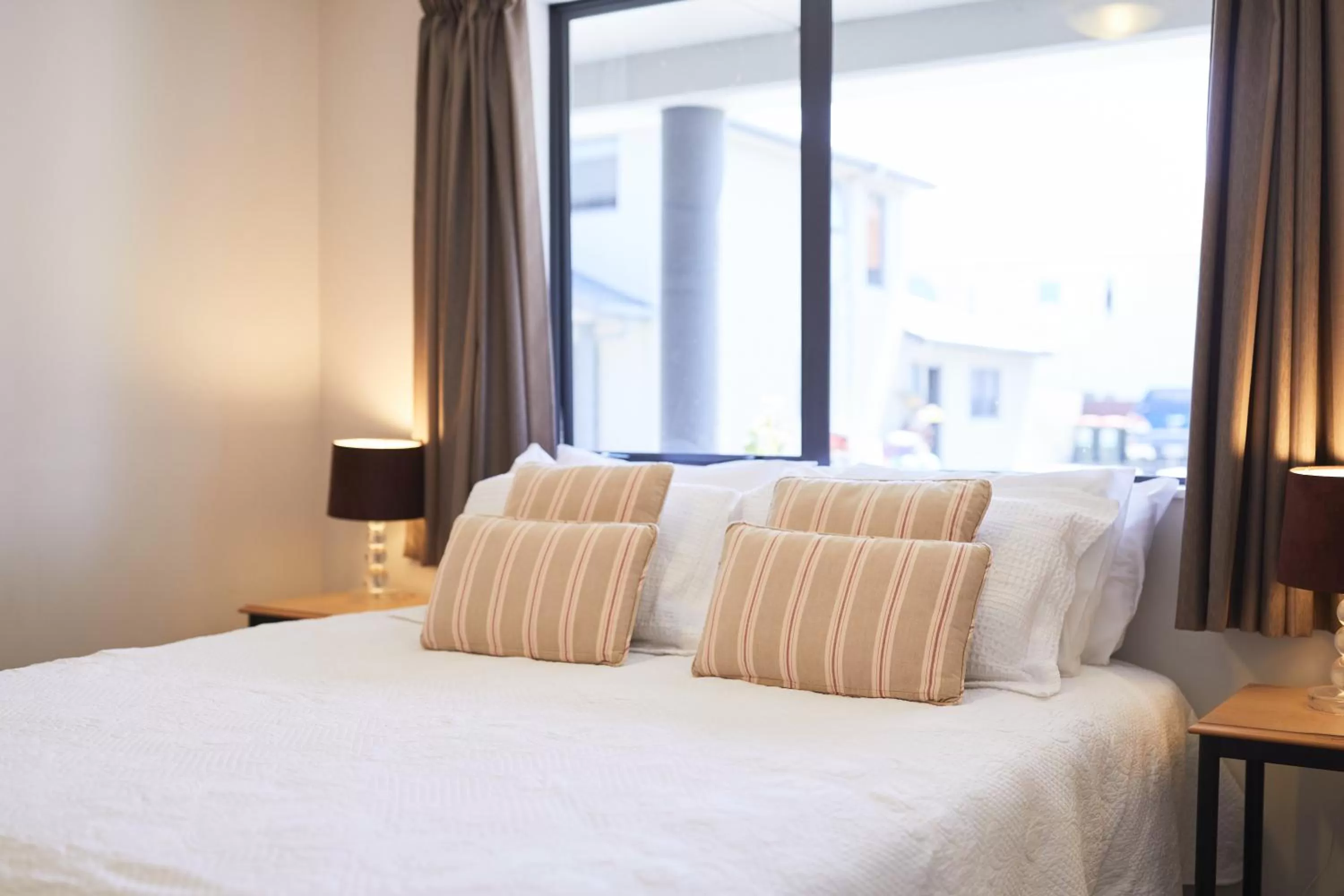 Bed in Blenheim Palms Motel