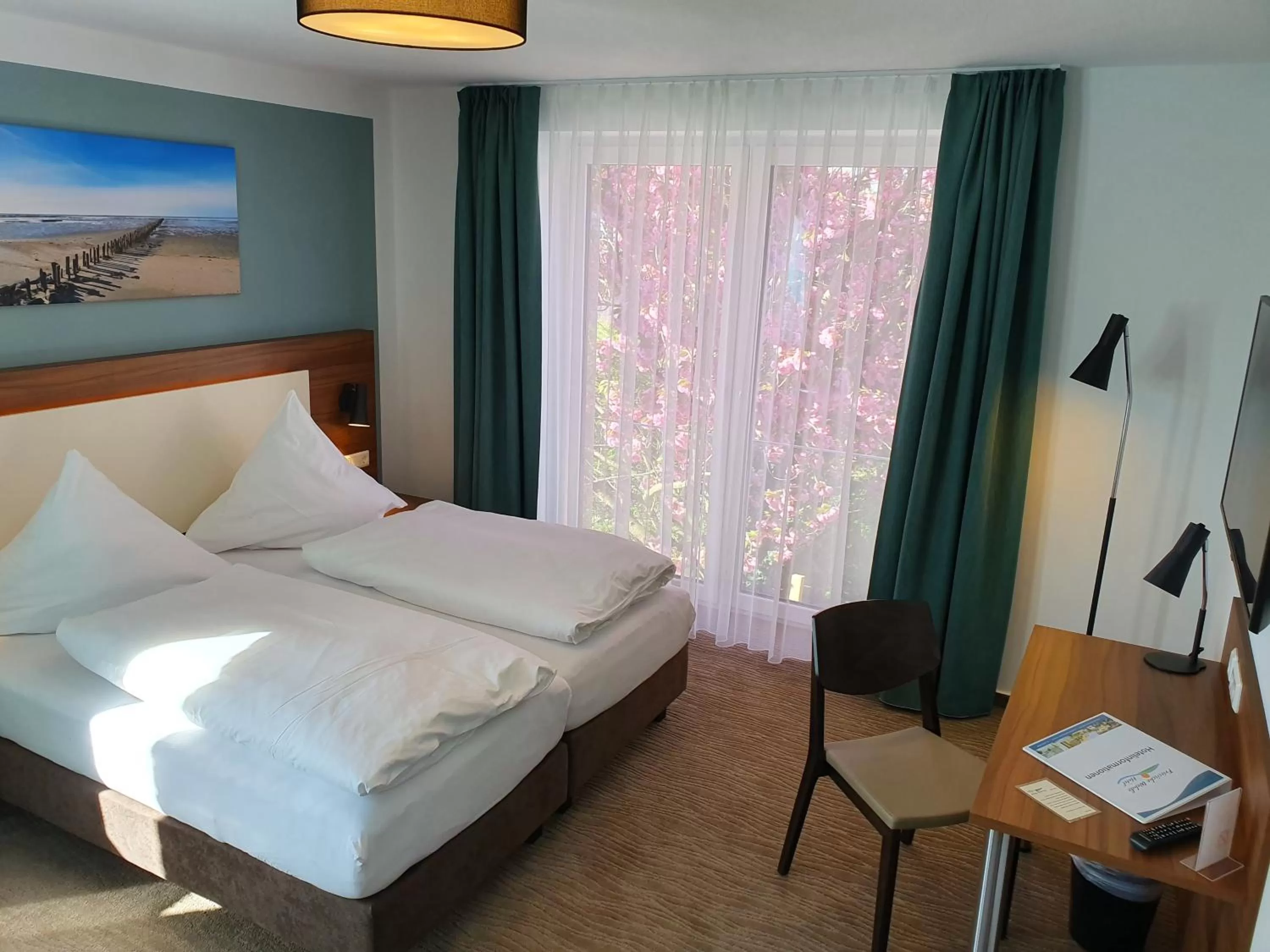 Photo of the whole room, Bed in Hotel Friesische Wehde