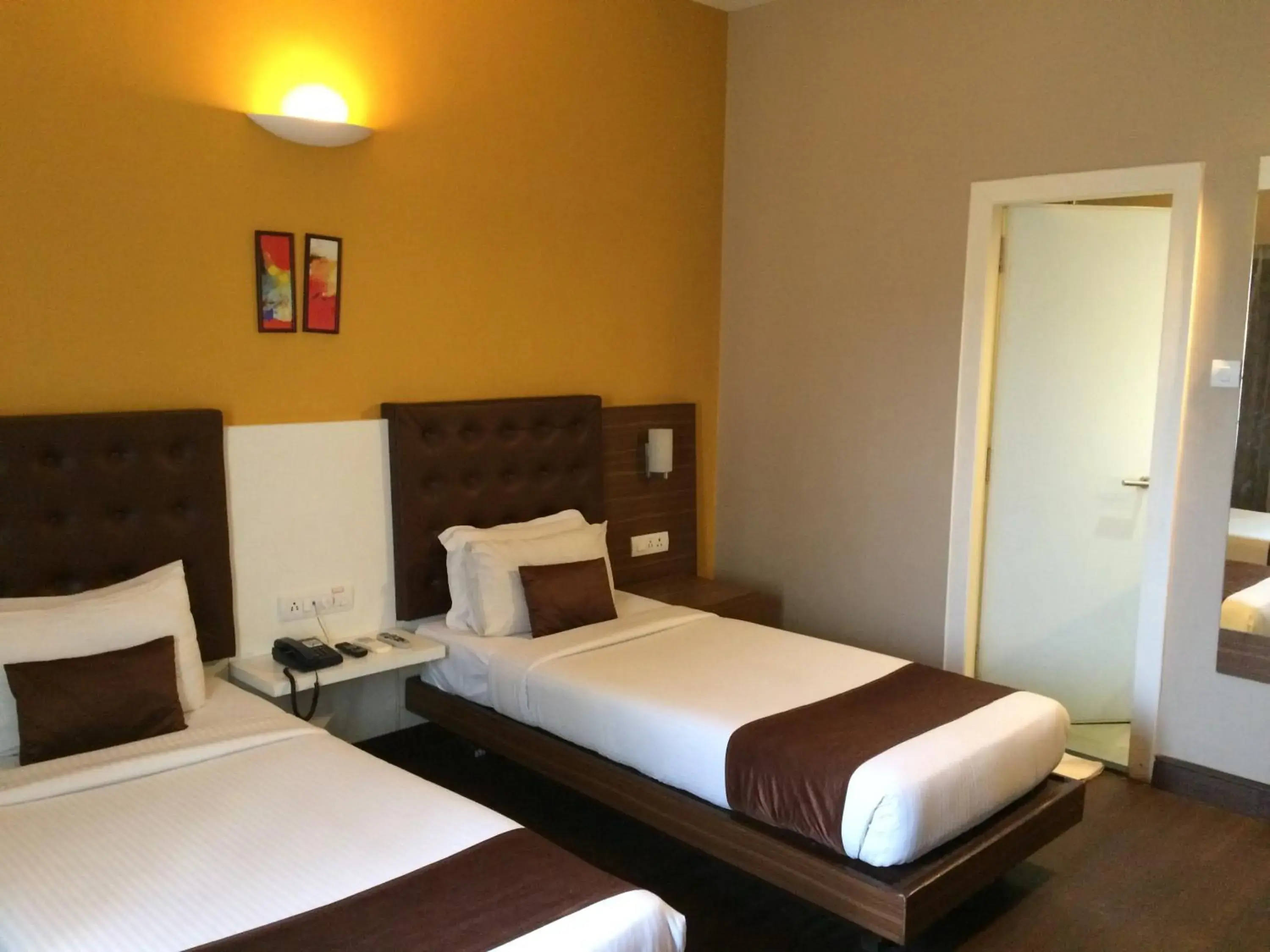 Photo of the whole room, Bed in Mango Hotels - Prangan