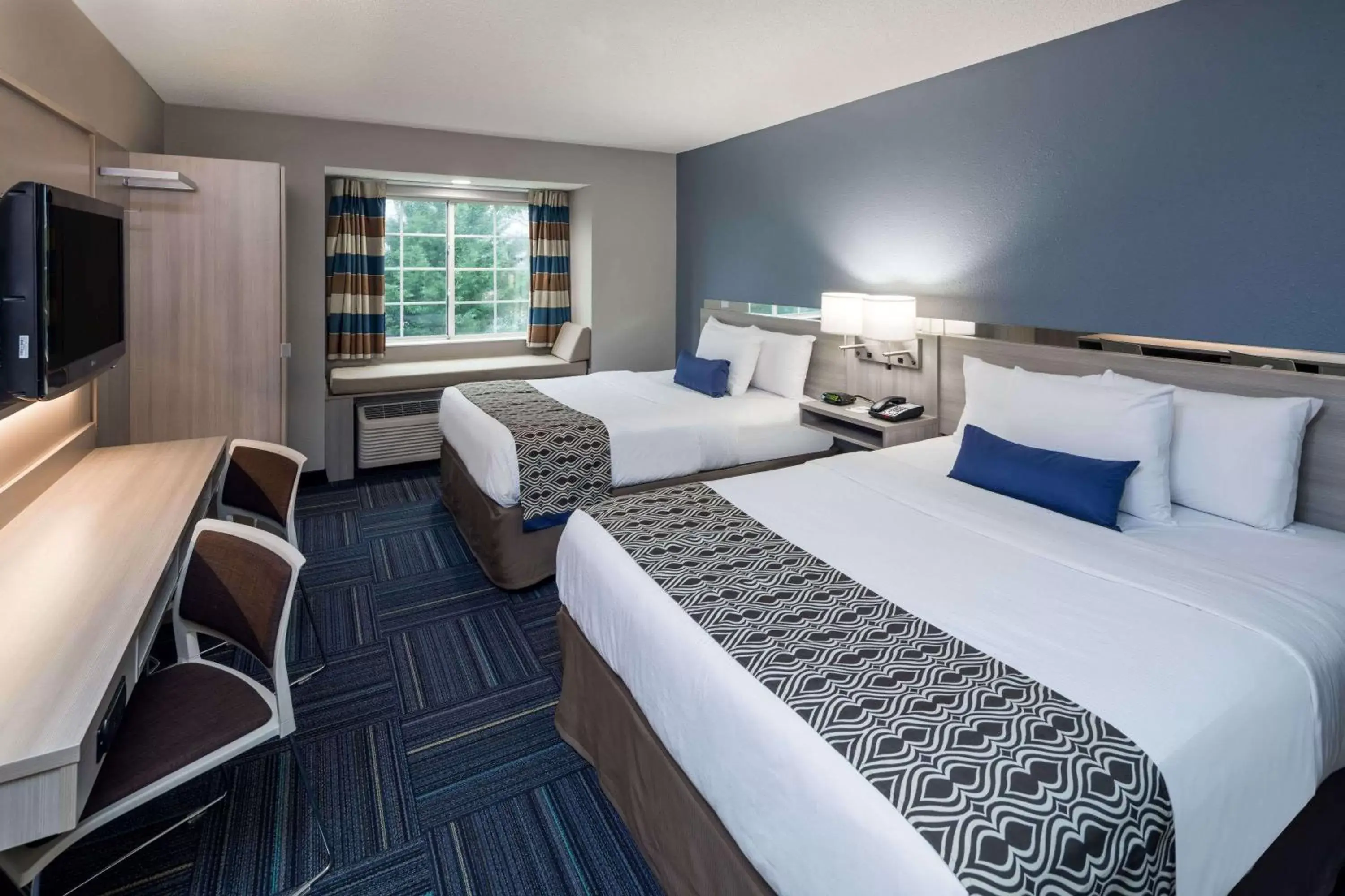 Photo of the whole room, Bed in Microtel Inn & Suites - Greenville