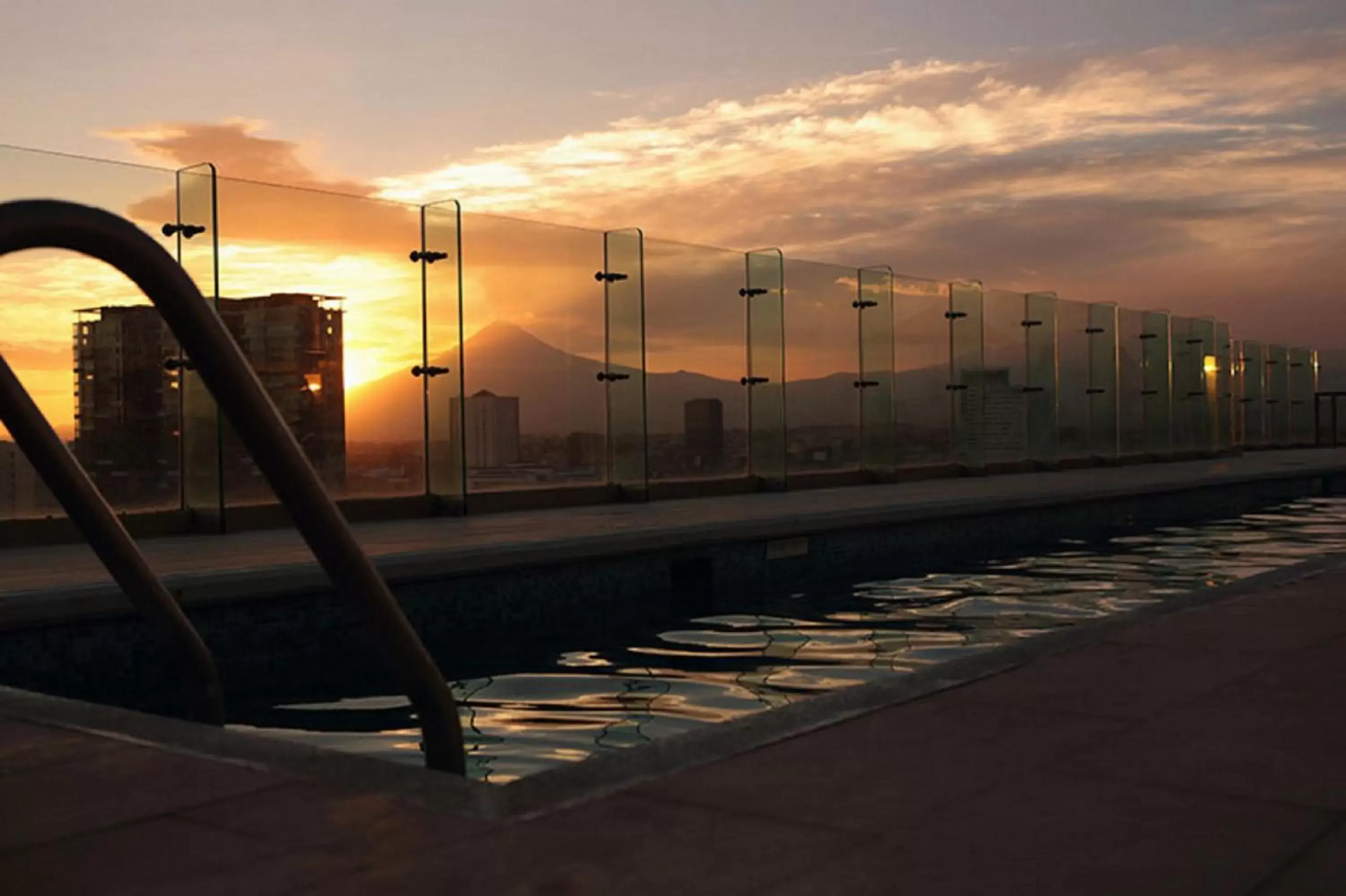 Swimming pool, Sunrise/Sunset in Holiday Inn Express & Suites Puebla Angelopolis, an IHG Hotel