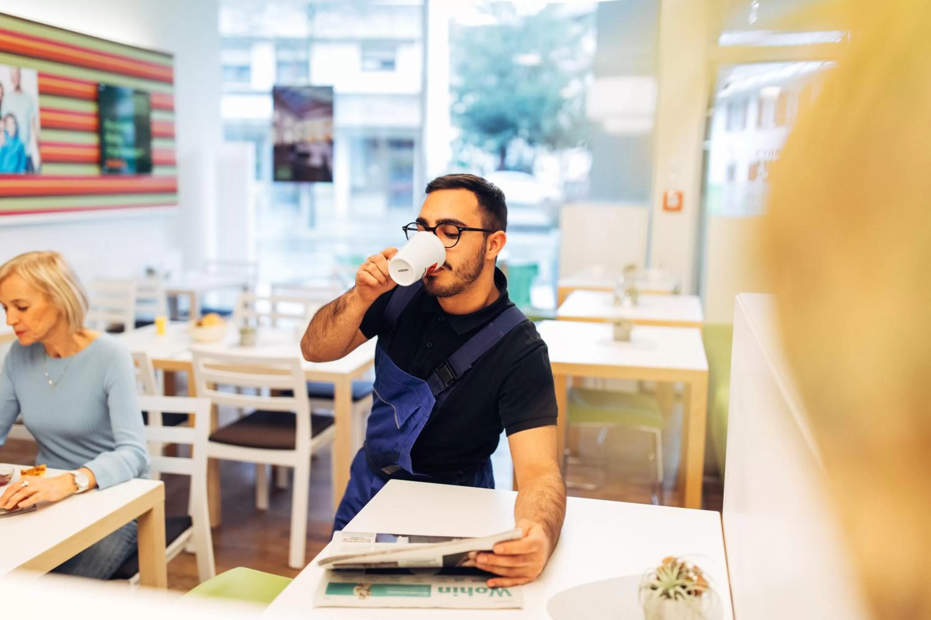 Communal lounge/ TV room in harry's home Dornbirn hotel & apartments