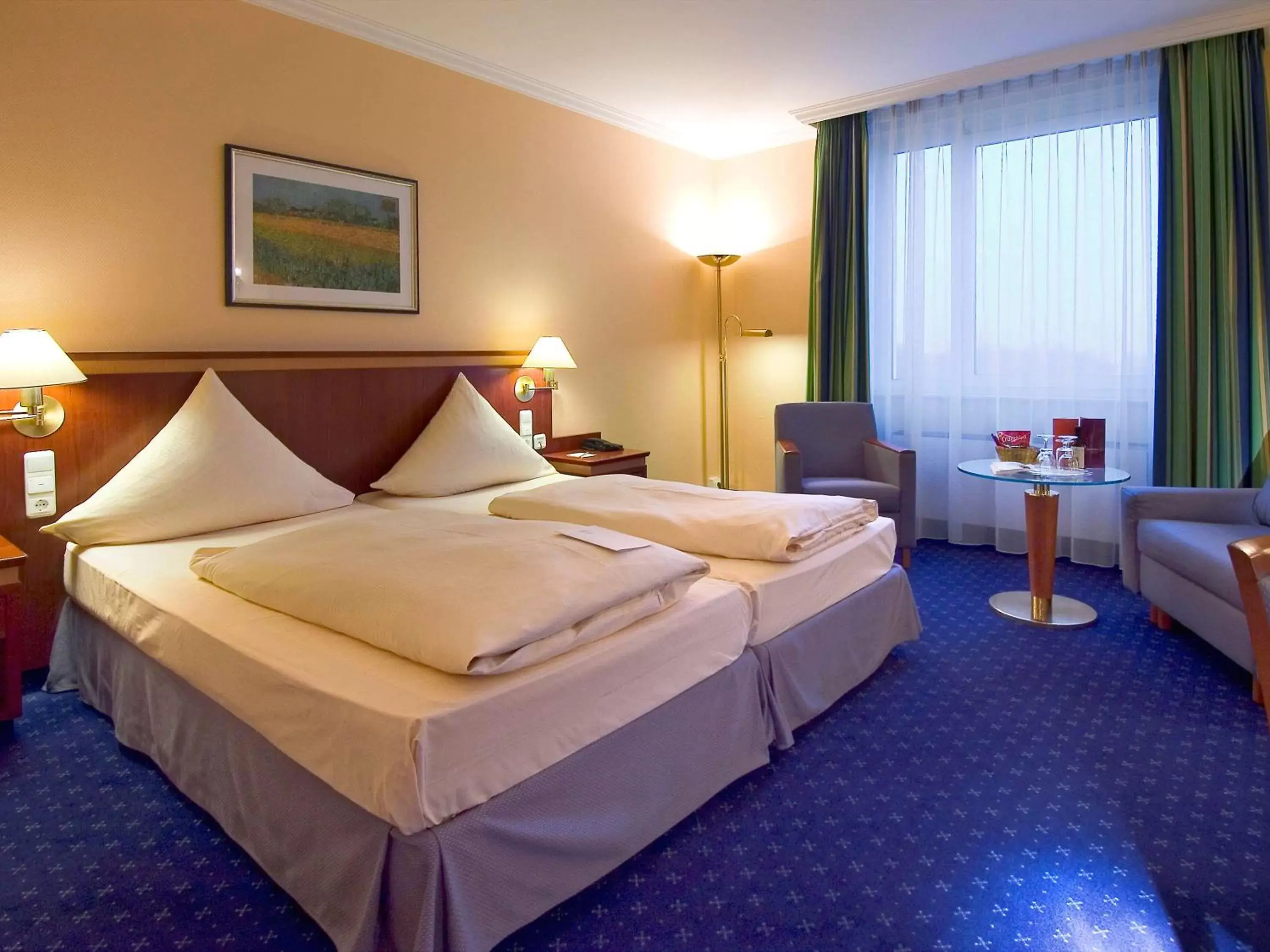 Photo of the whole room, Bed in Mercure Hotel Trier Porta Nigra