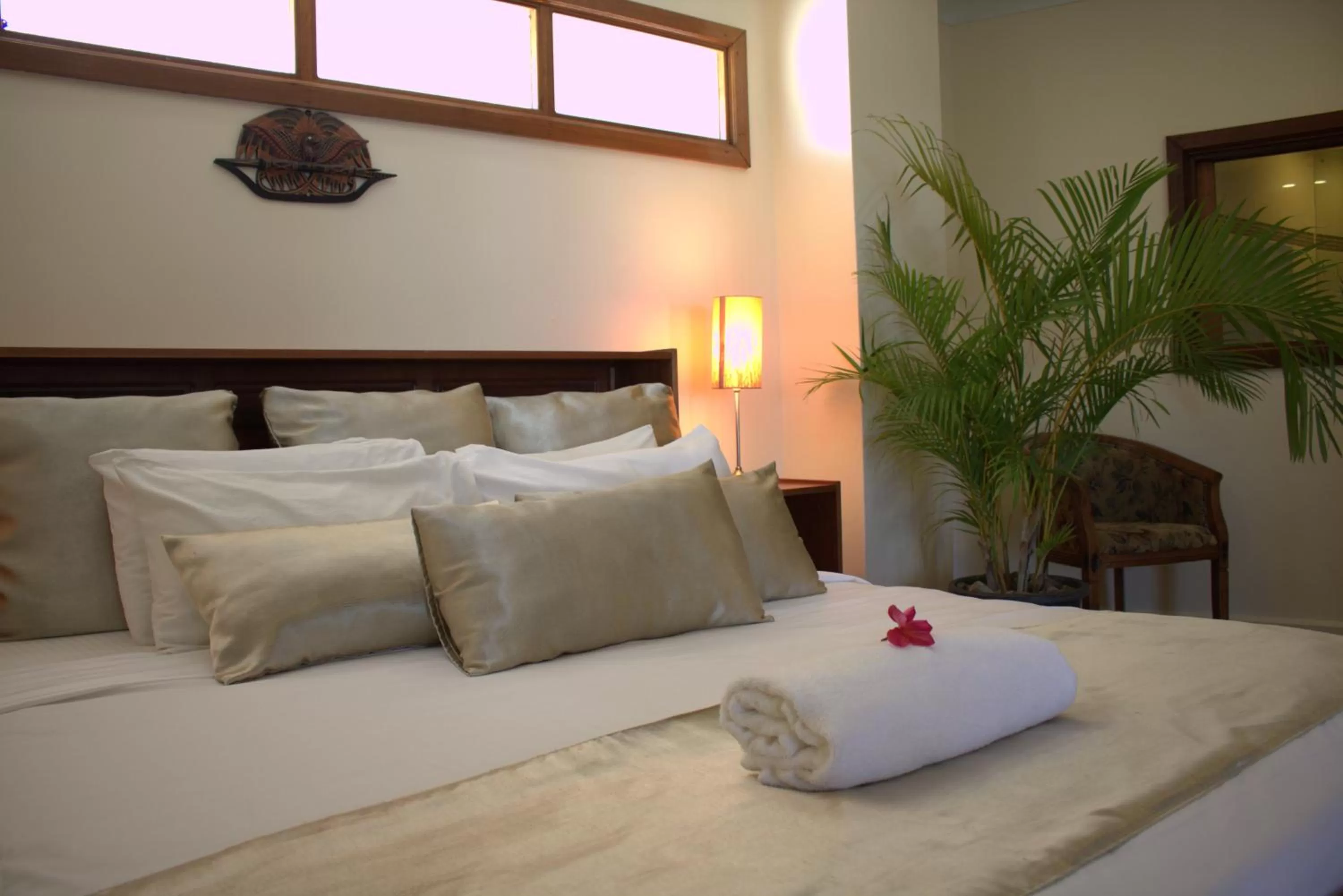Bed in Rapopo Plantation Resort