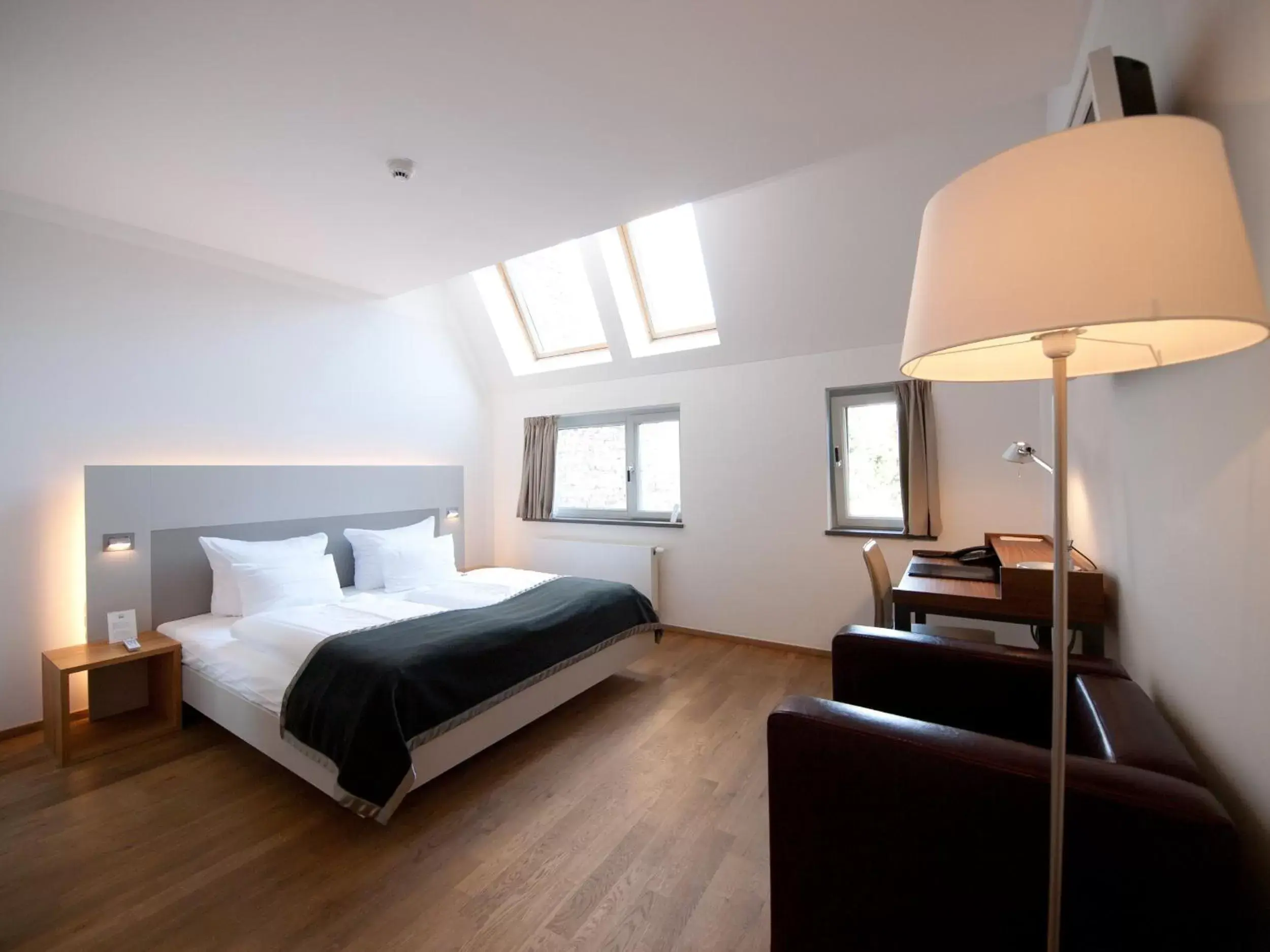 Photo of the whole room, Bed in Qube Hotel Bergheim