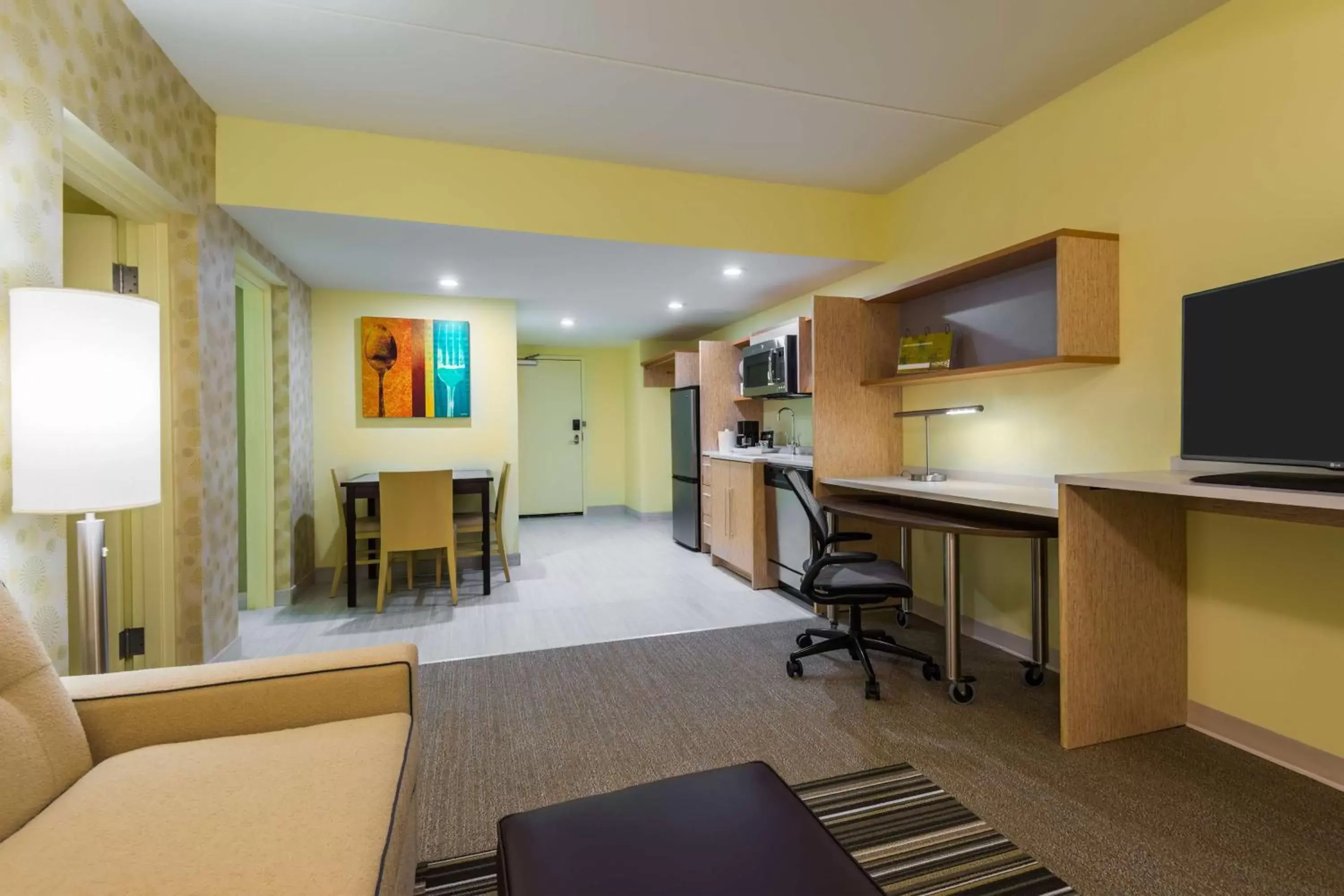 Bedroom, Kitchen/Kitchenette in Home2 Suites by Hilton Buffalo Airport/ Galleria Mall