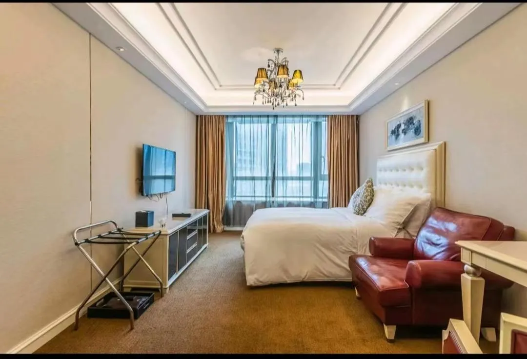 Wealthy All Suite Hotel Suzhou