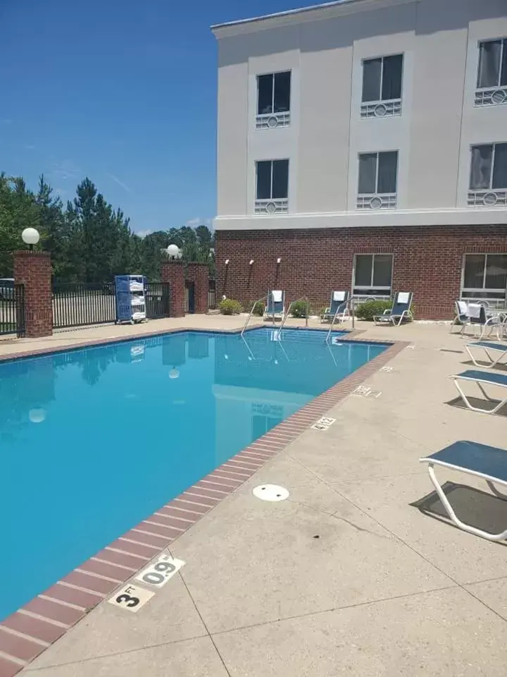 Swimming Pool in Holiday Inn Express Hotel & Suites Lucedale, an IHG Hotel