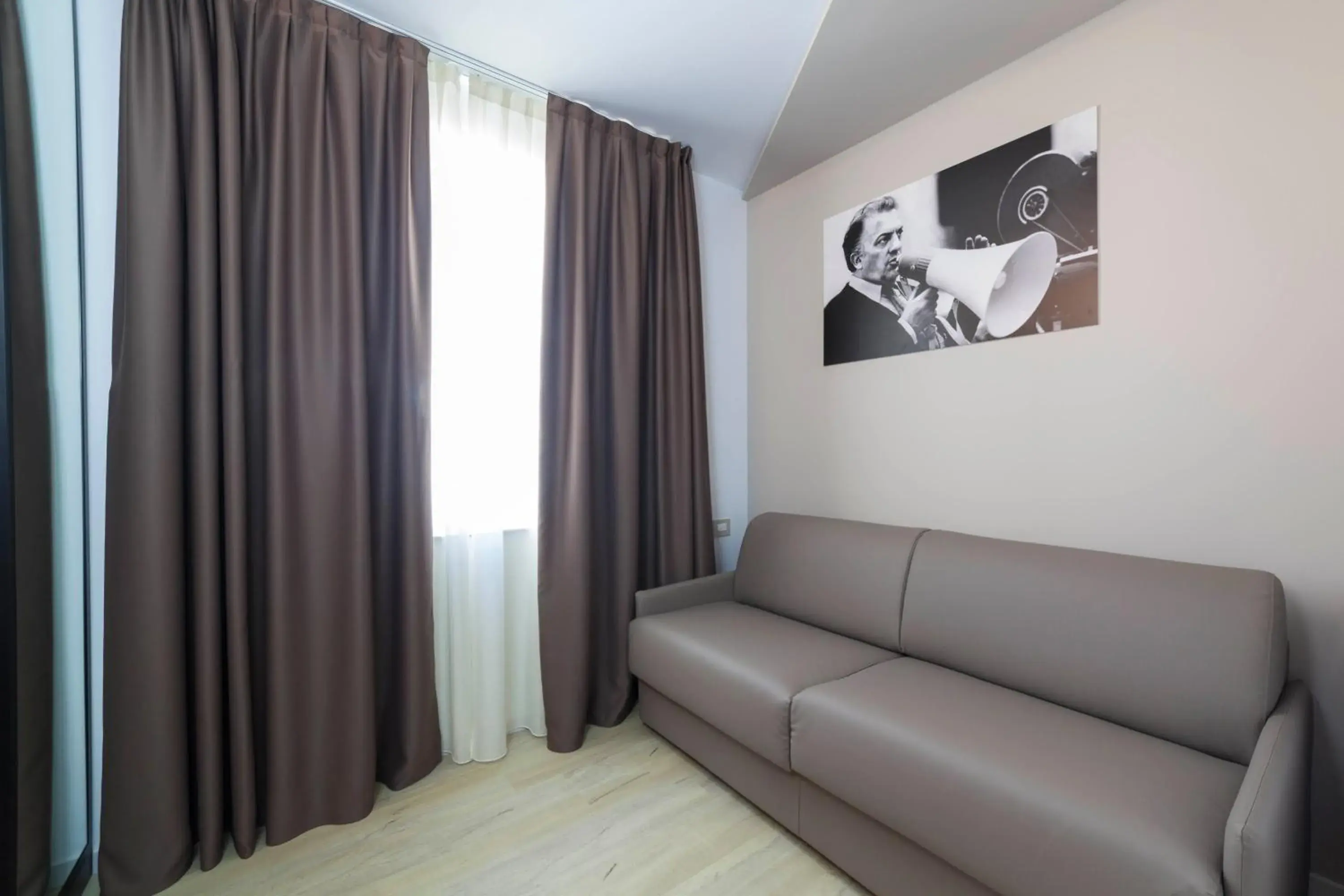 Bedroom, Seating Area in Hotel La Gradisca