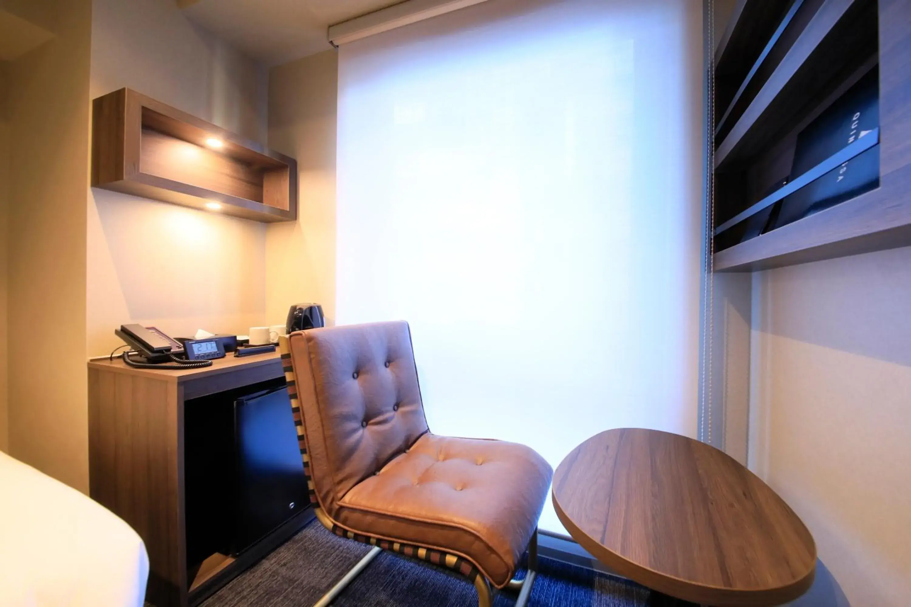 Photo of the whole room, TV/Entertainment Center in Quintessa Hotel Tokyo Ginza